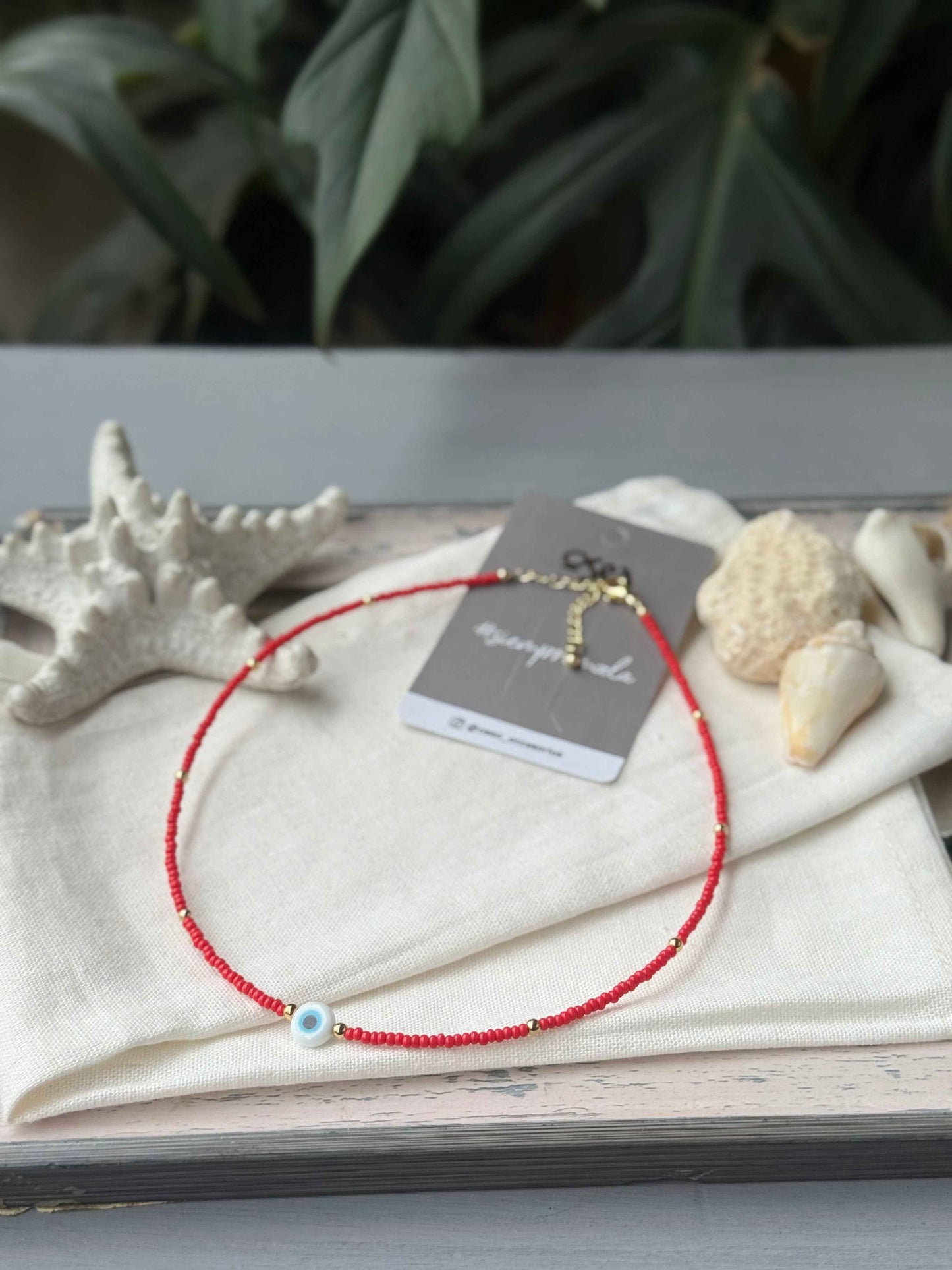 Choker mostacilla y balines dije ojo