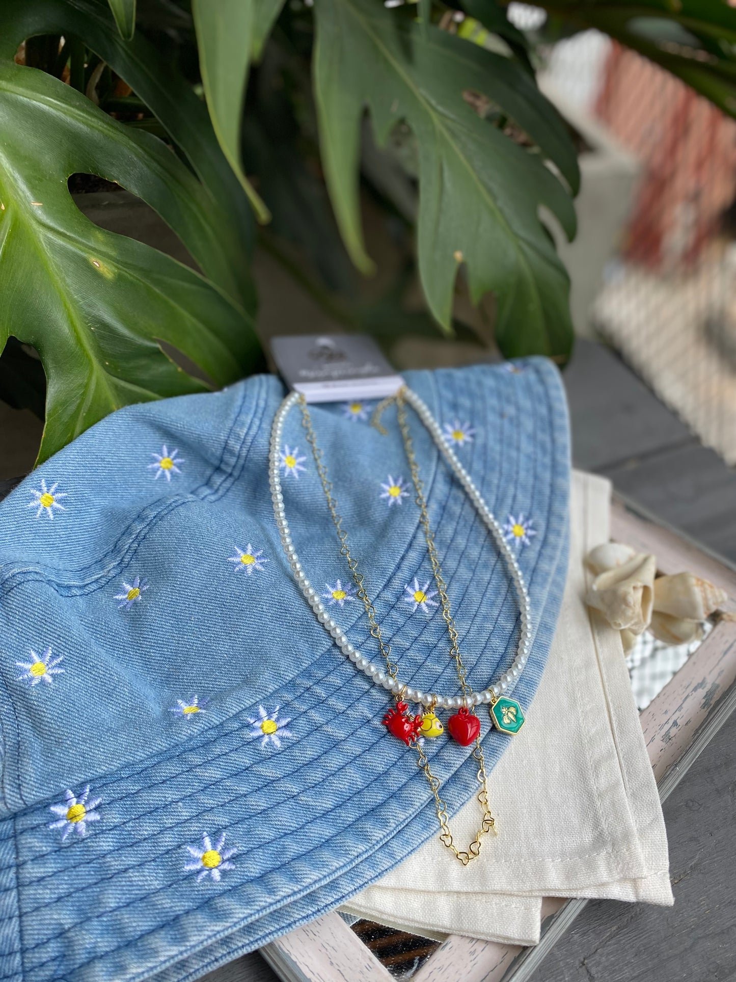 Collar doble perlas y dijes