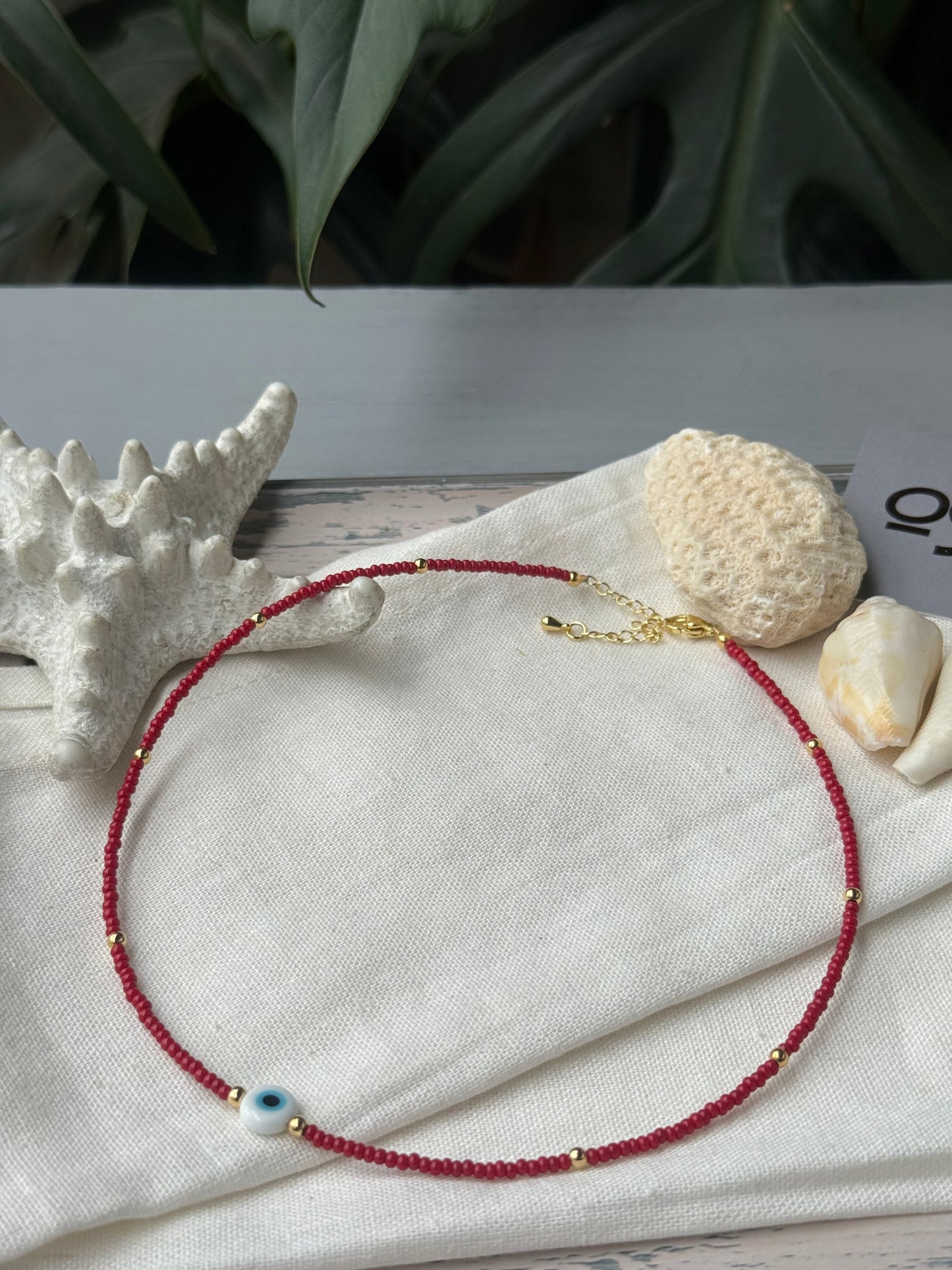 Choker mostacilla y balines dije ojo