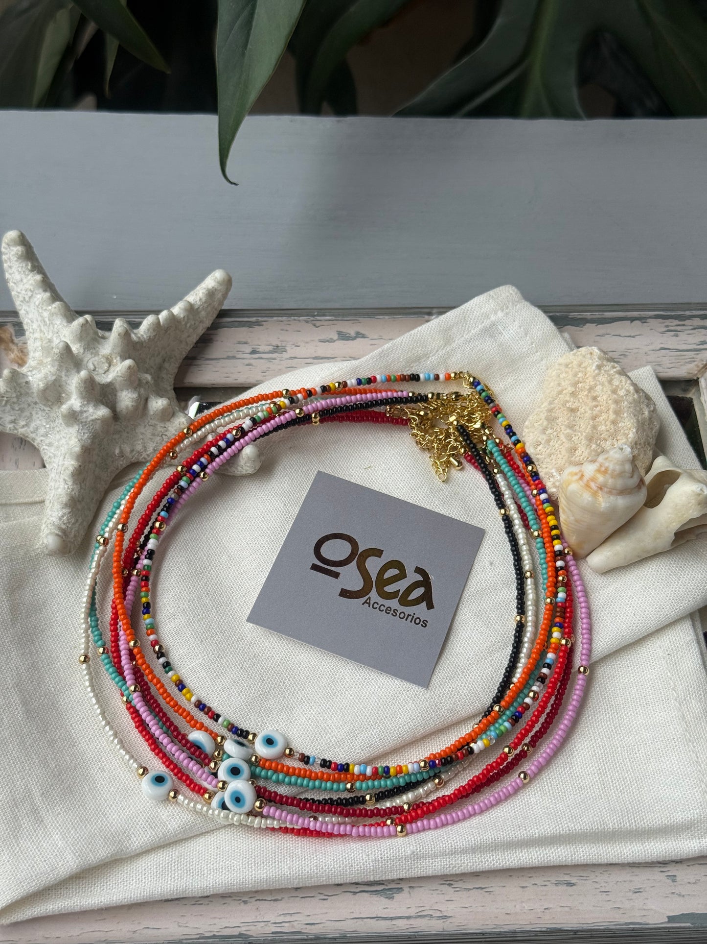 Choker mostacilla y balines dije ojo