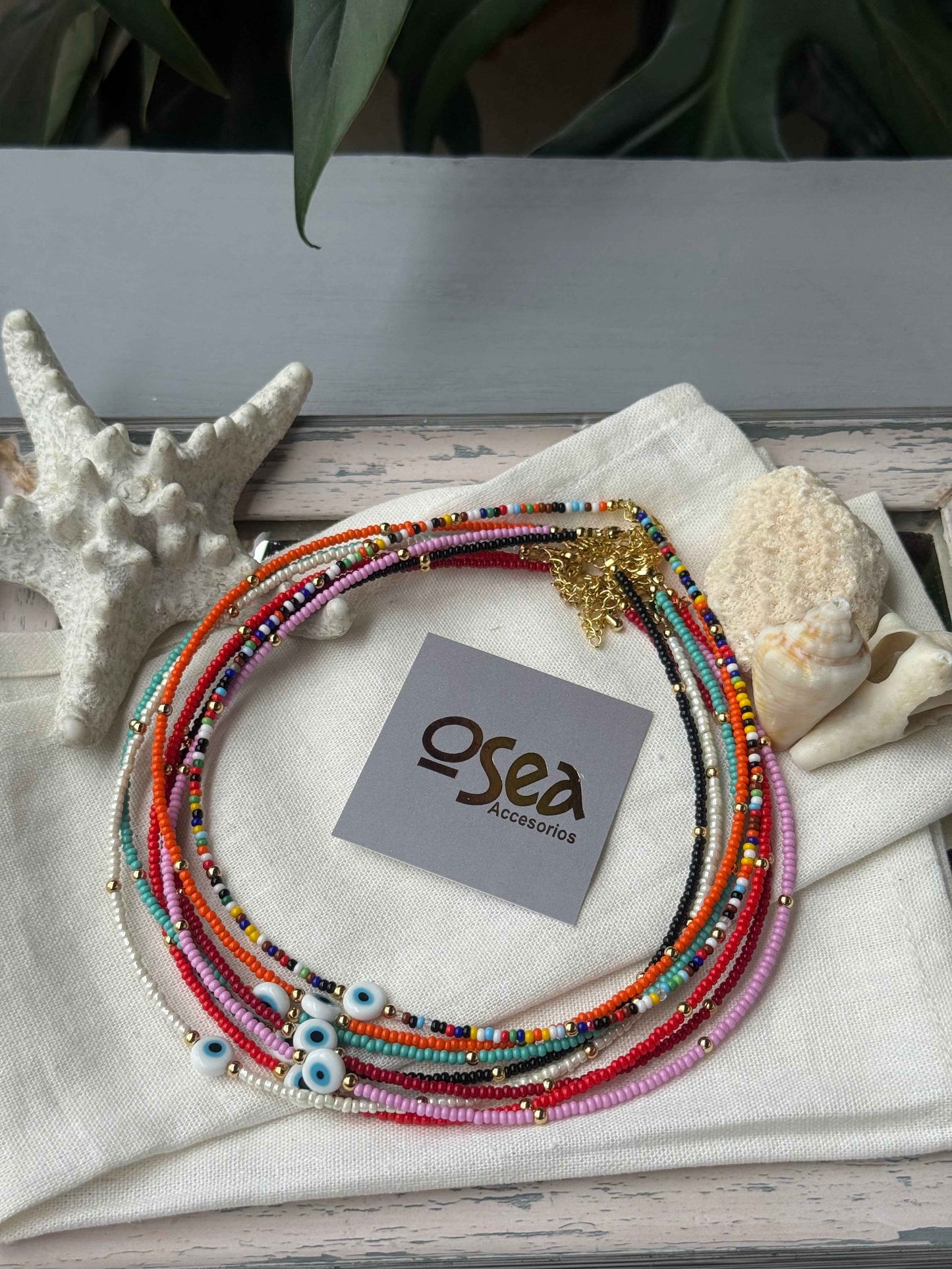 Choker mostacilla y balines dije ojo