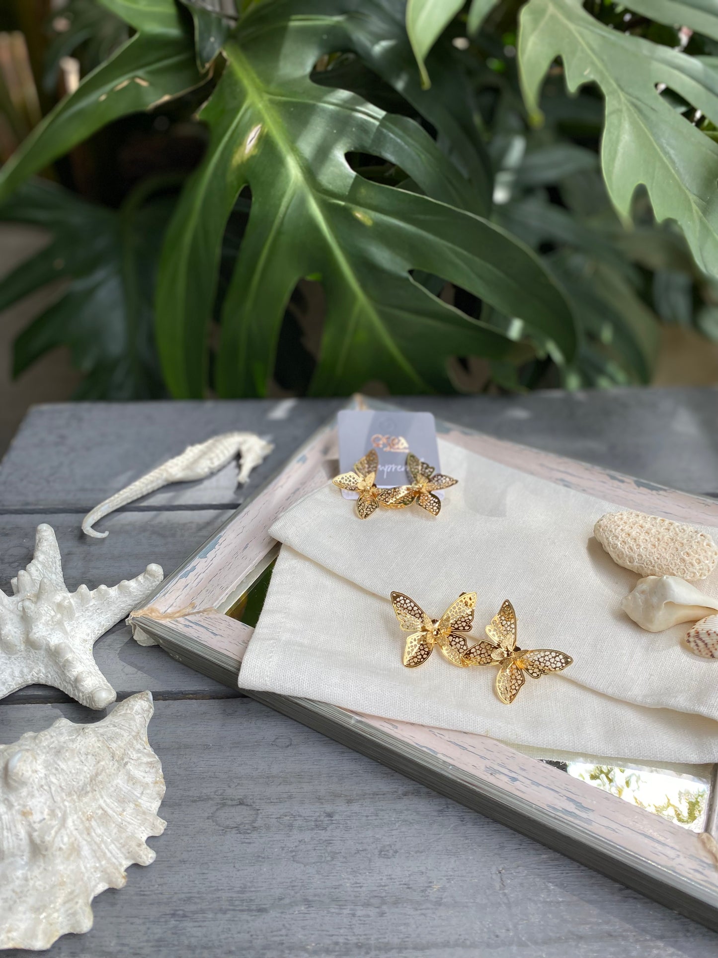 Topos mariposa doble en bronce