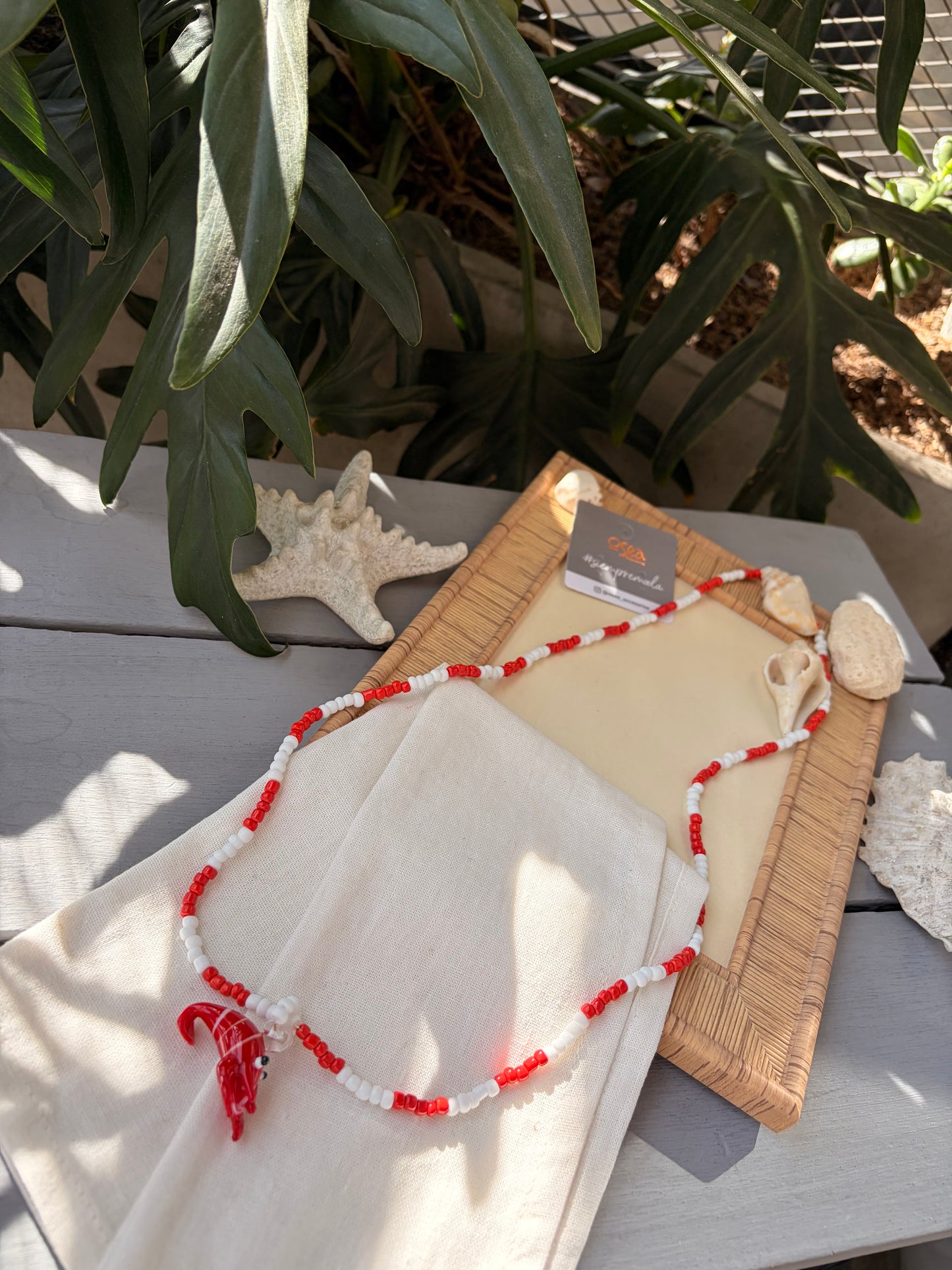 Collar largo en mostacilla dije langosta en cristal