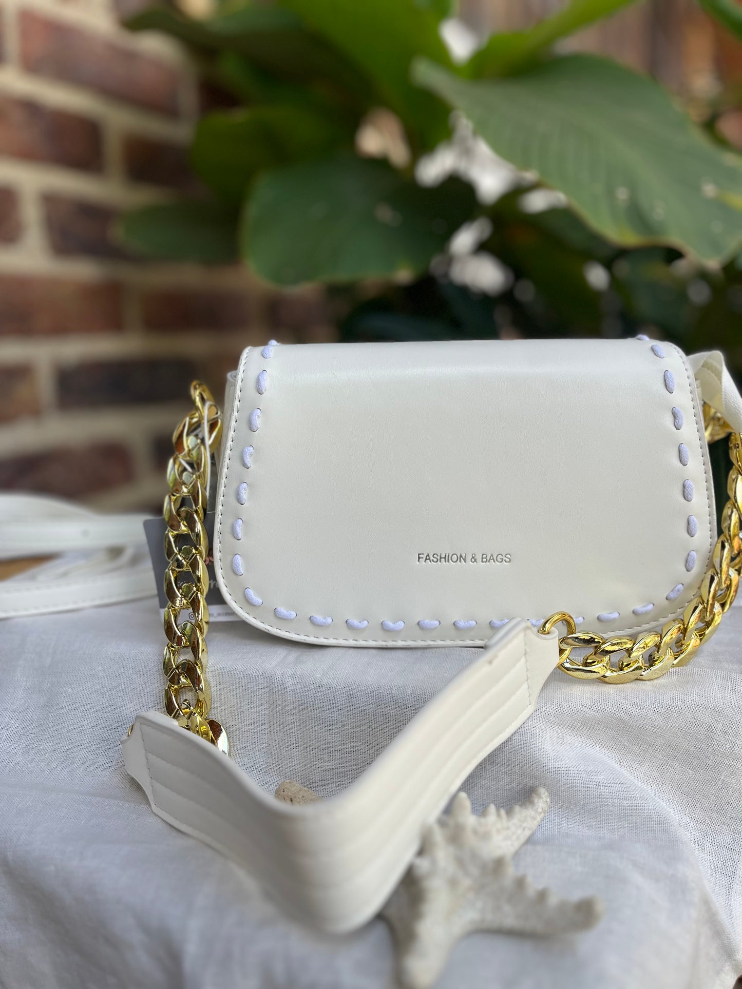 Bolso manos libres con costura doble cargadera