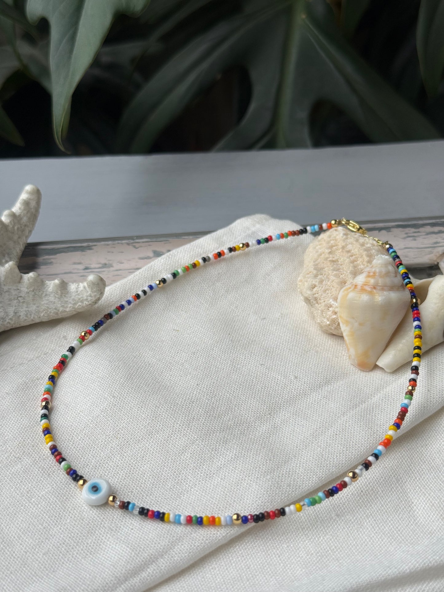 Choker mostacilla y balines dije ojo