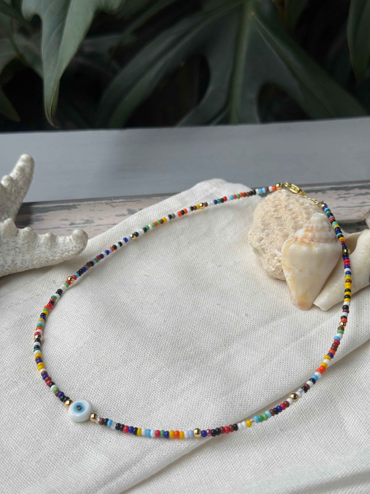 Choker mostacilla y balines dije ojo