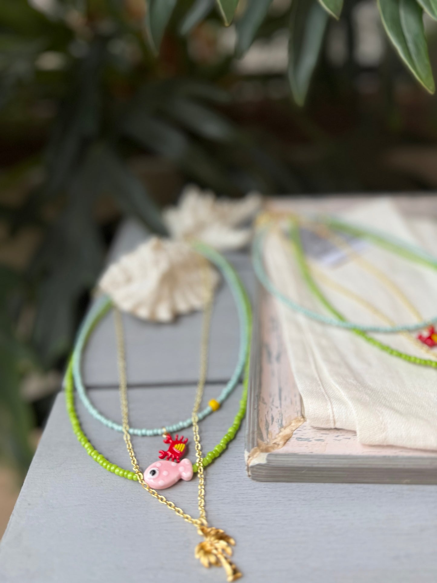 Collar triple palmera y pez