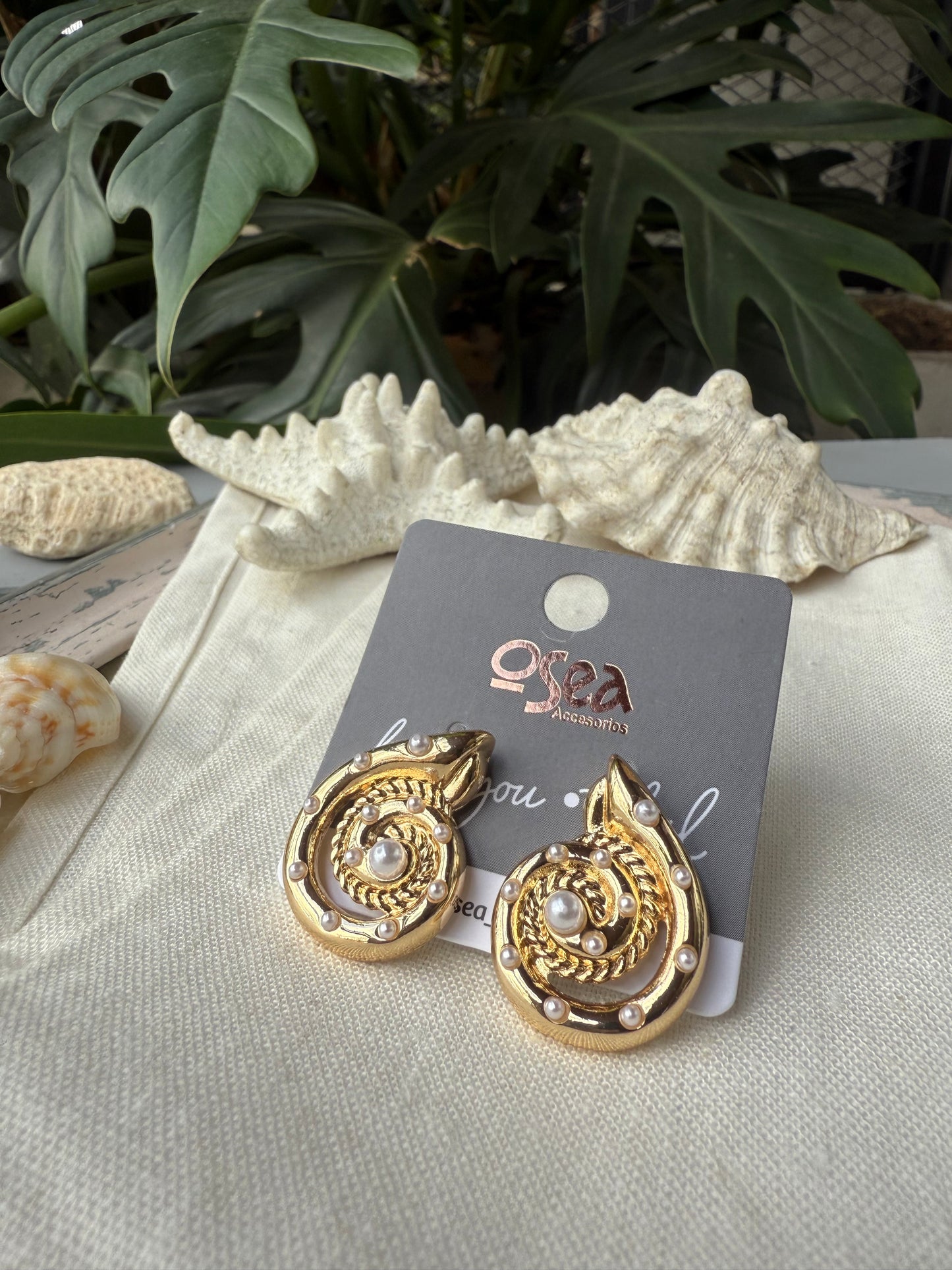 Topos rodinados caracol y perlas