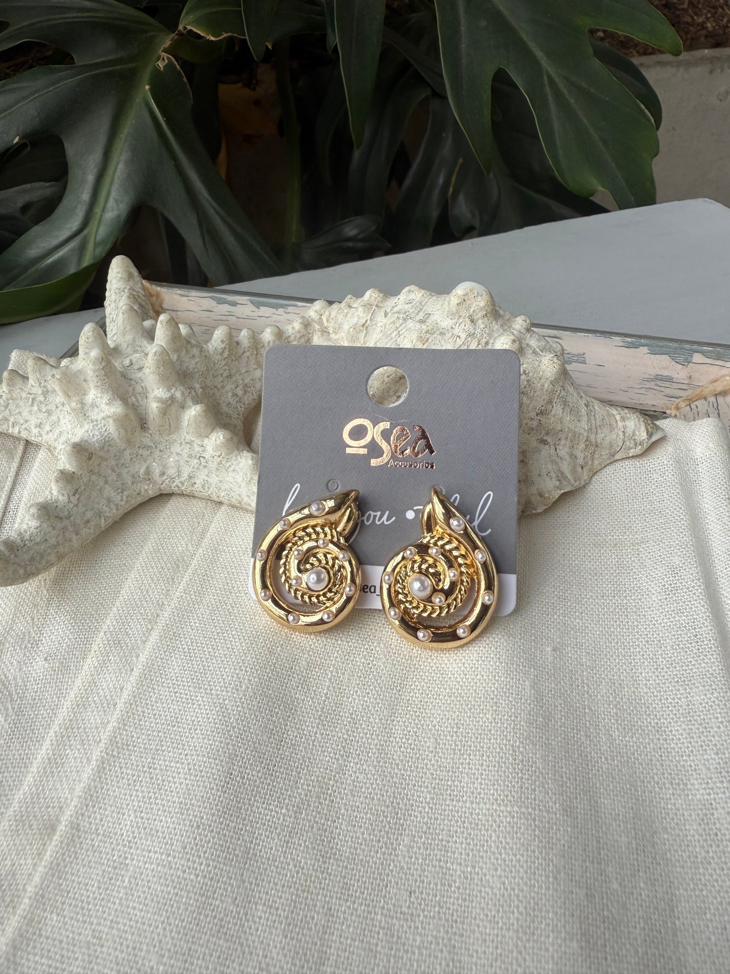 Topos rodinados caracol y perlas