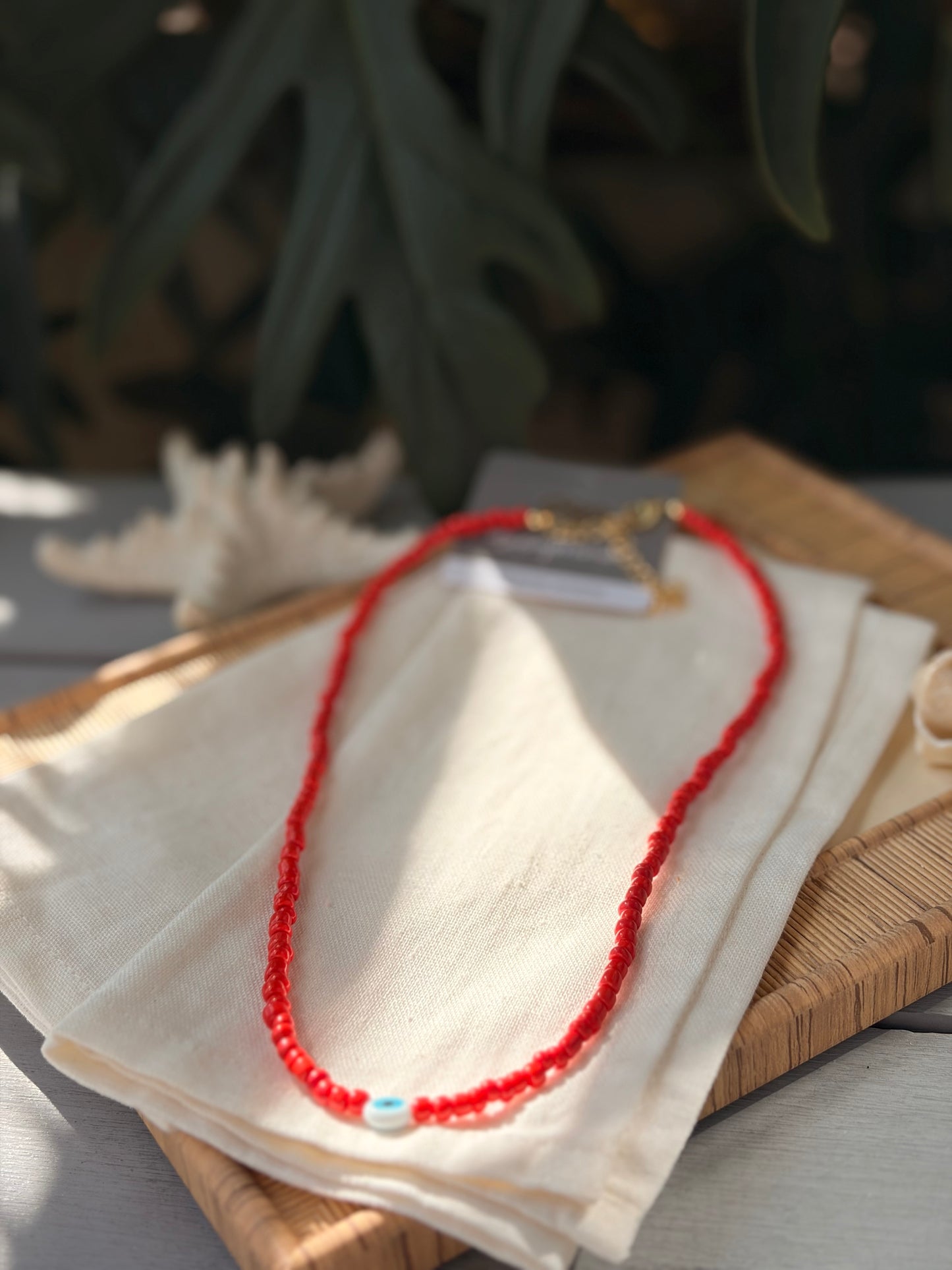 Collar mostacilla mediana roja dije ojo