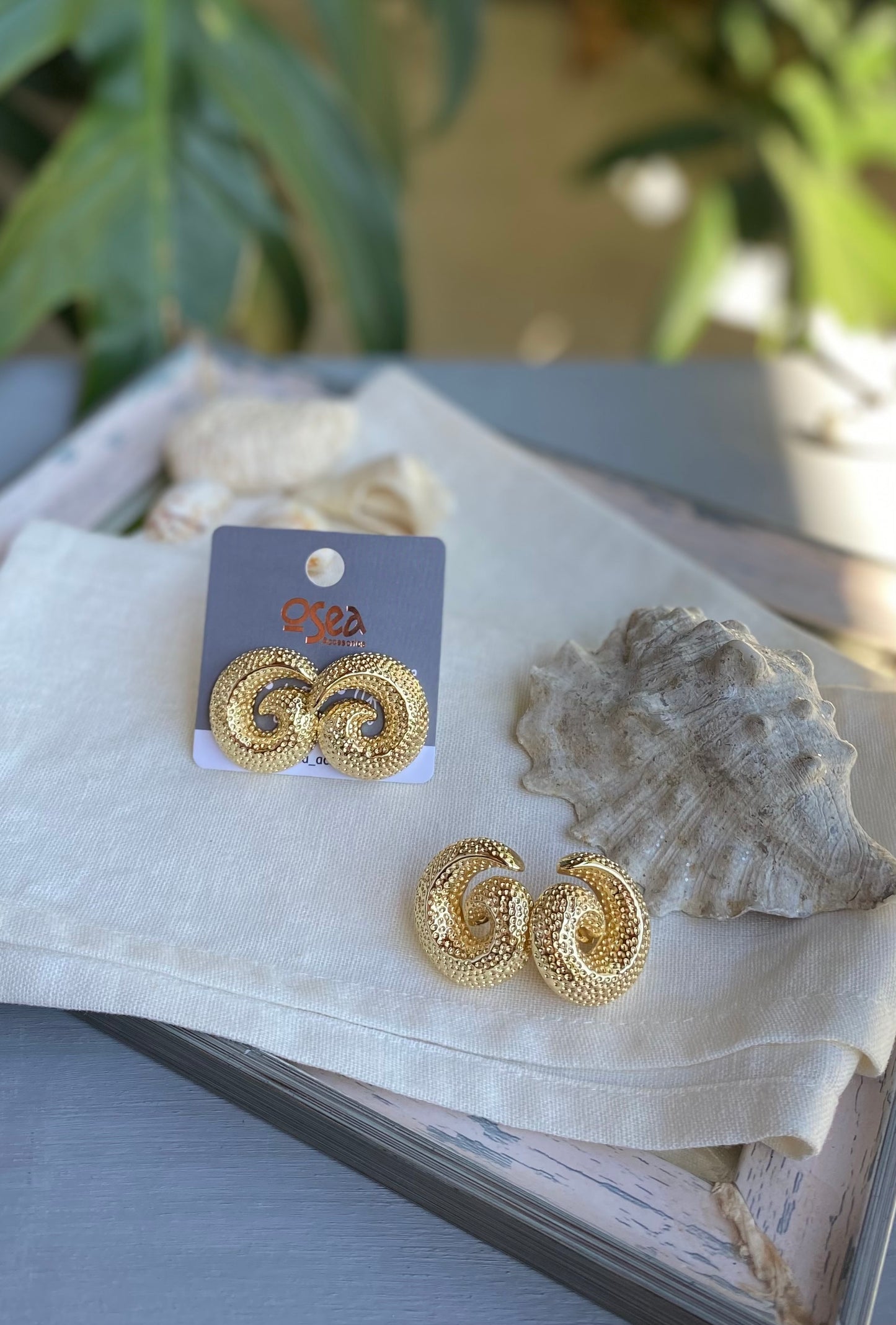 Topos caracol oro golfied con textura