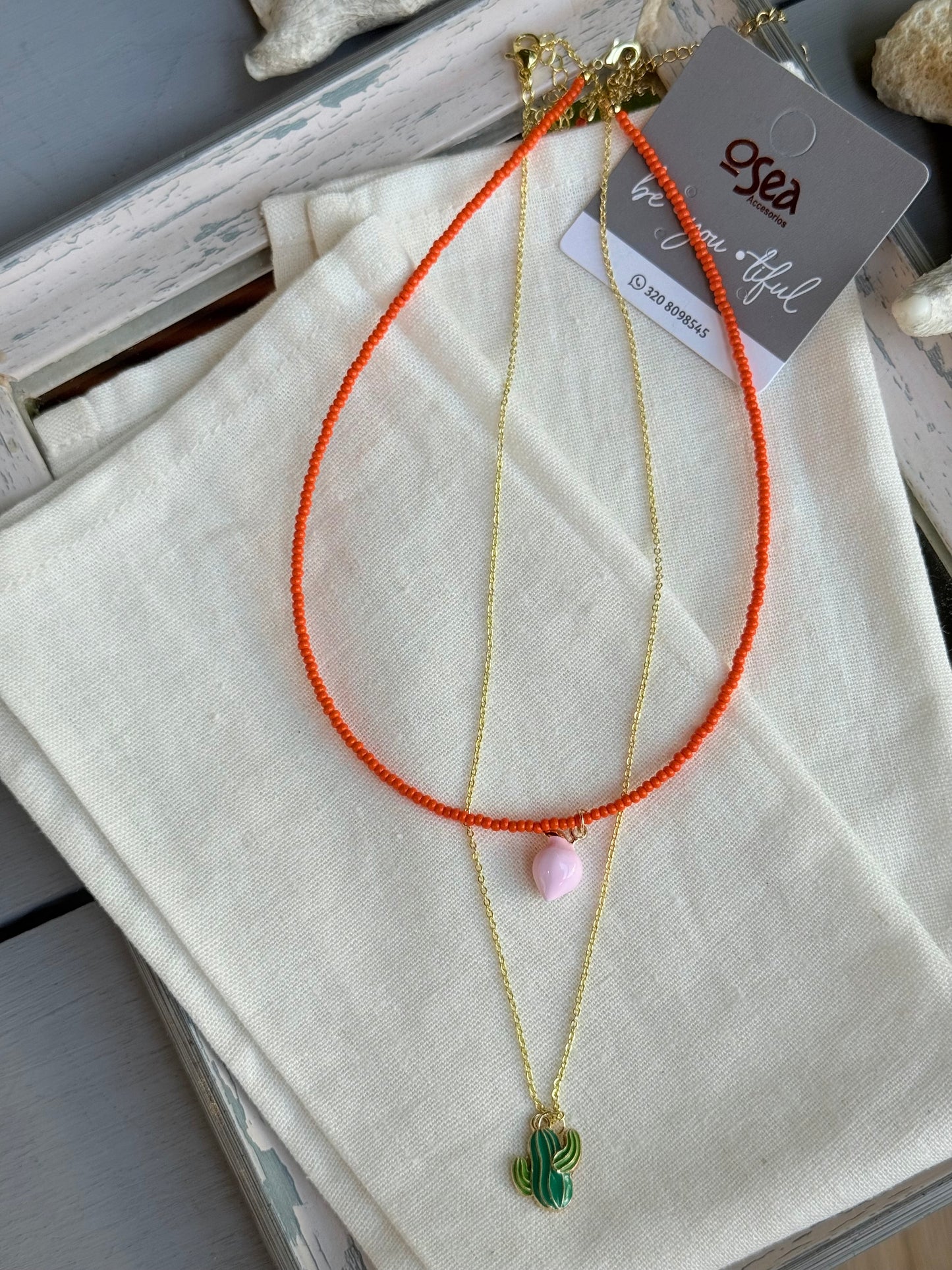 Collar doble mostacillas y cadena dijes