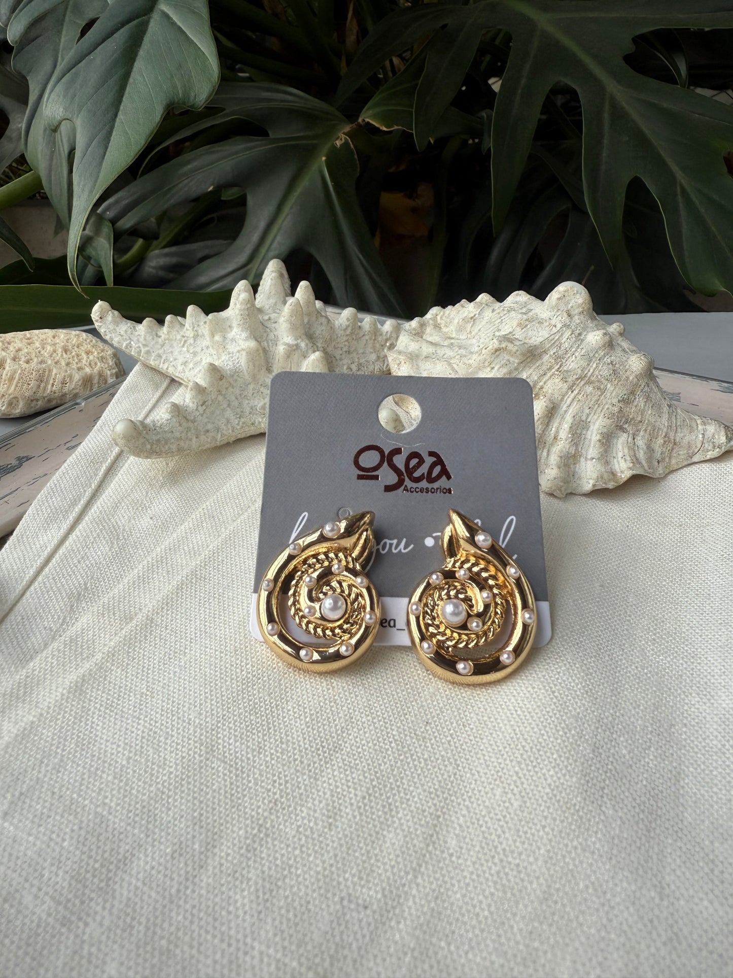 Topos rodinados caracol y perlas