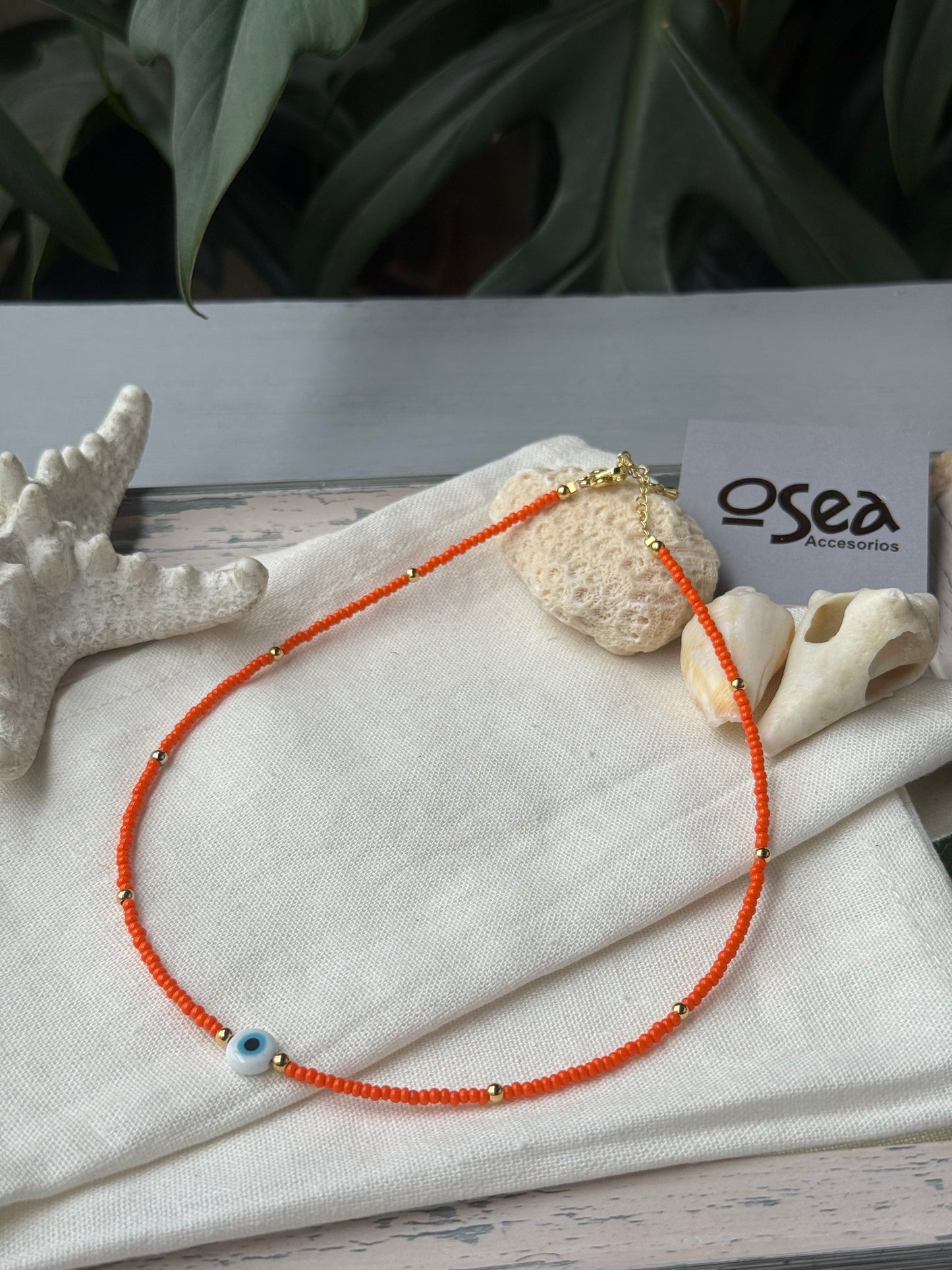 Choker mostacilla y balines dije ojo