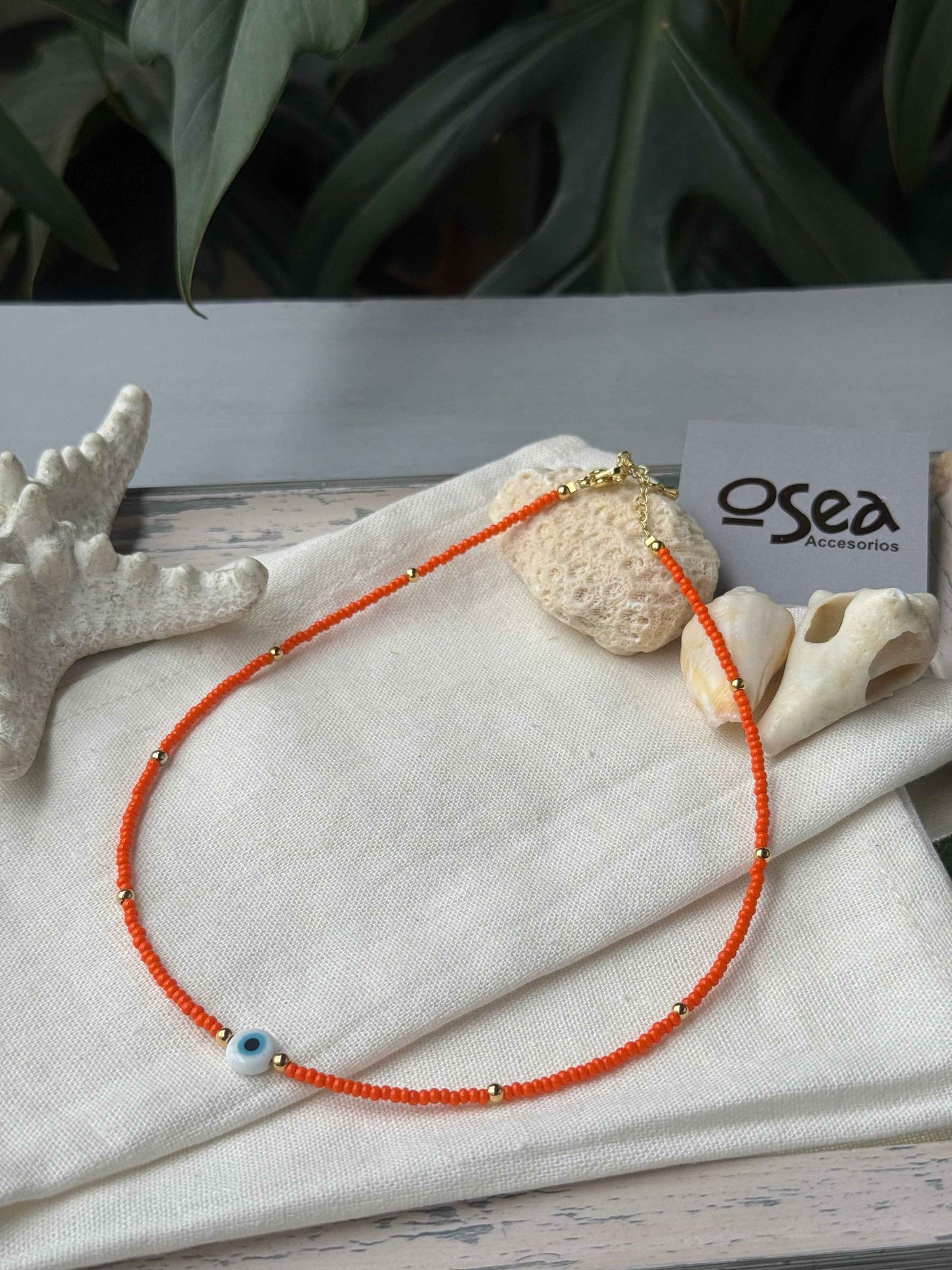 Choker mostacilla y balines dije ojo