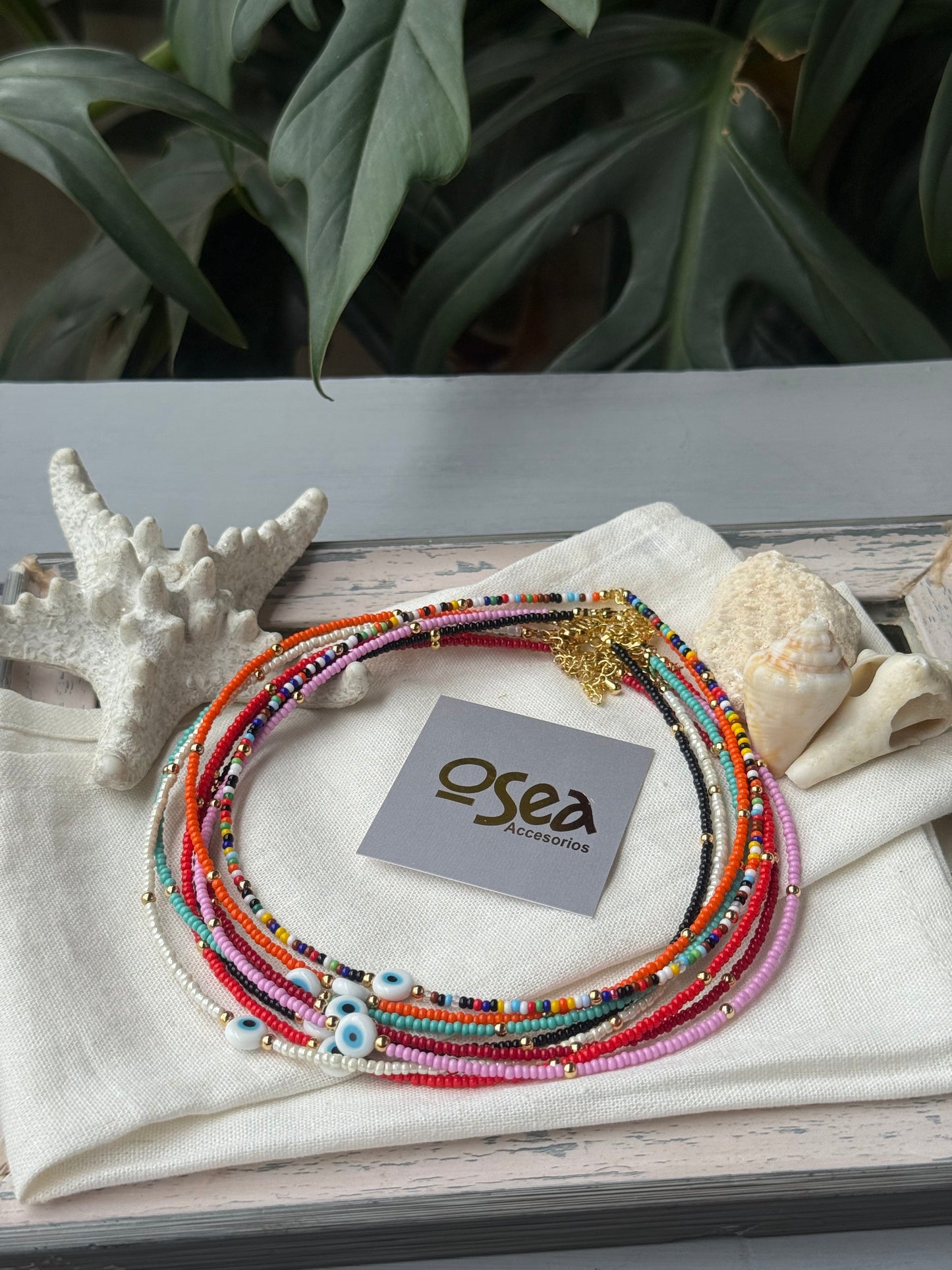 Choker mostacilla y balines dije ojo