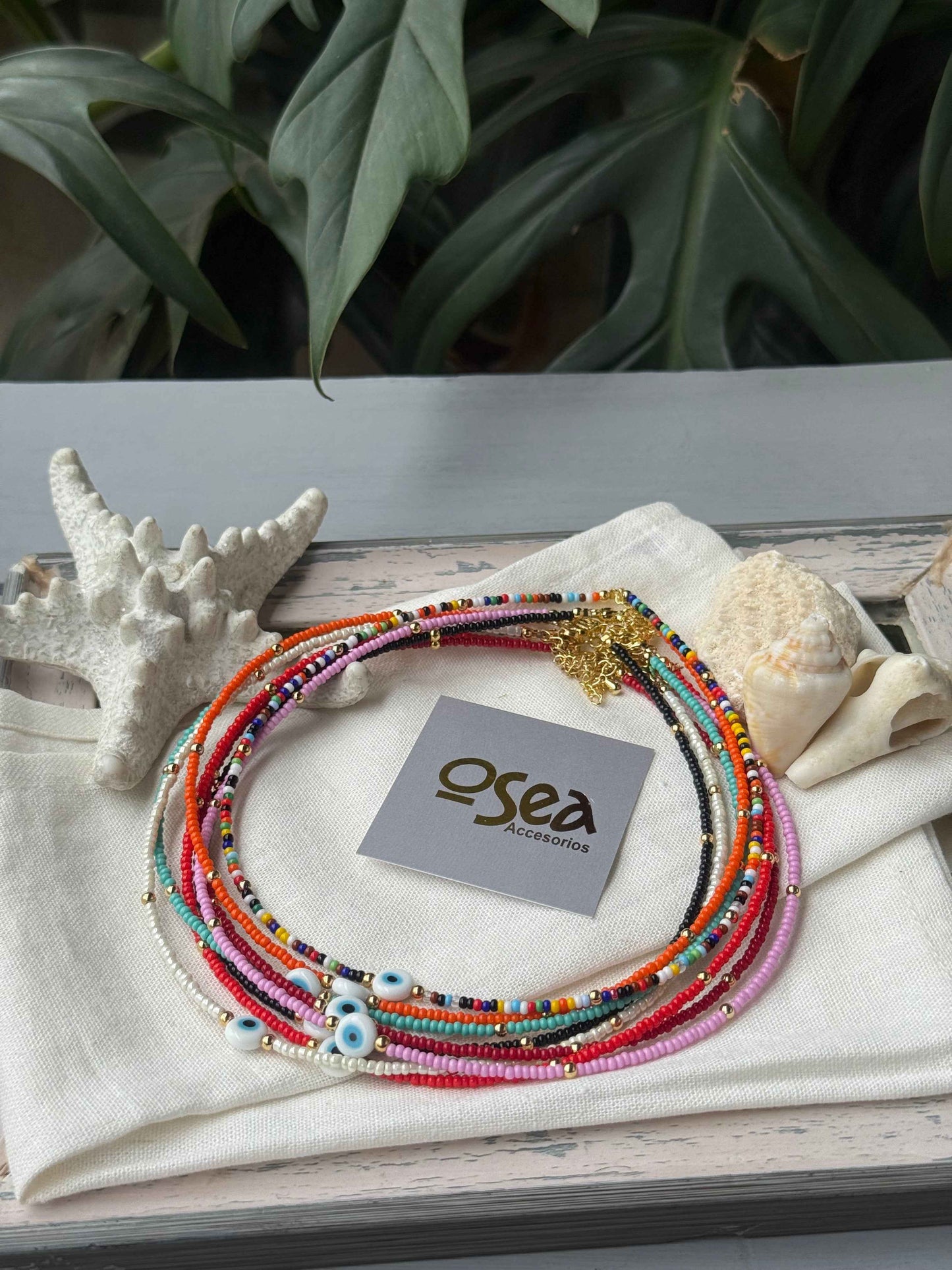 Choker mostacilla y balines dije ojo