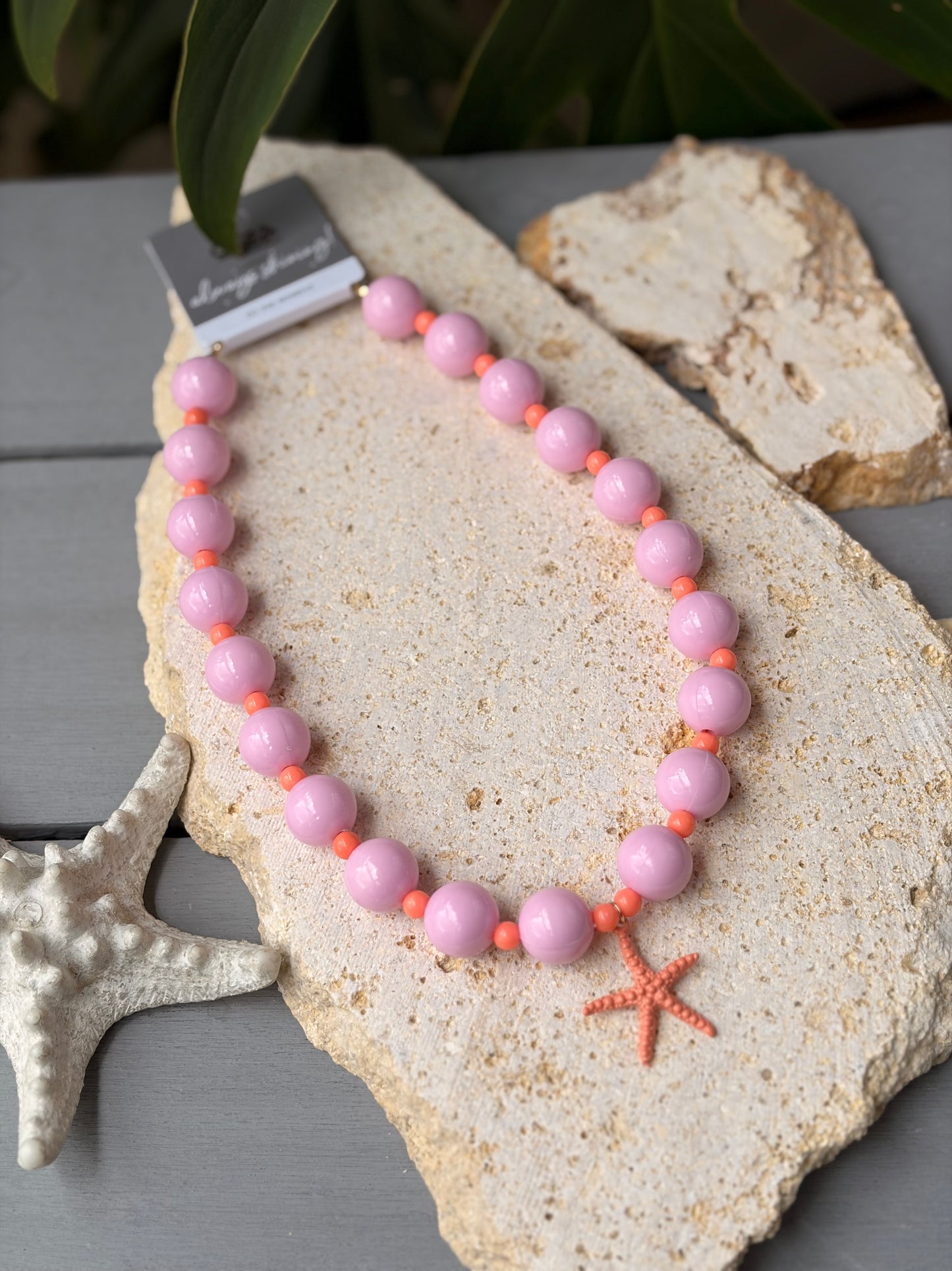 Collar bolas rosadas dije estrella de mar esmaltada