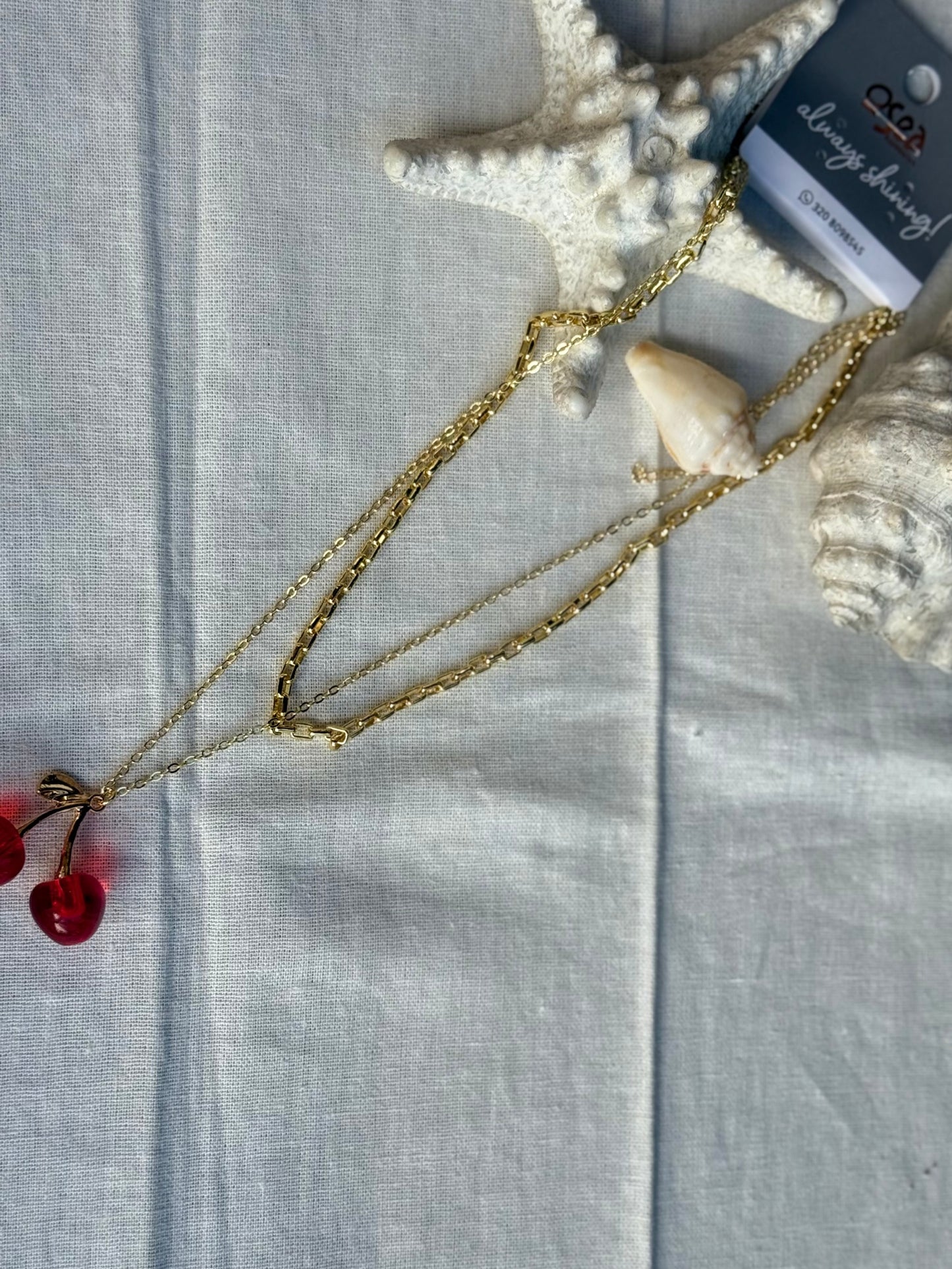 Collar rodinado doble dije cerezas