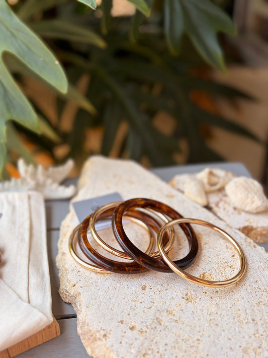 Pulseras set rodinado y resina