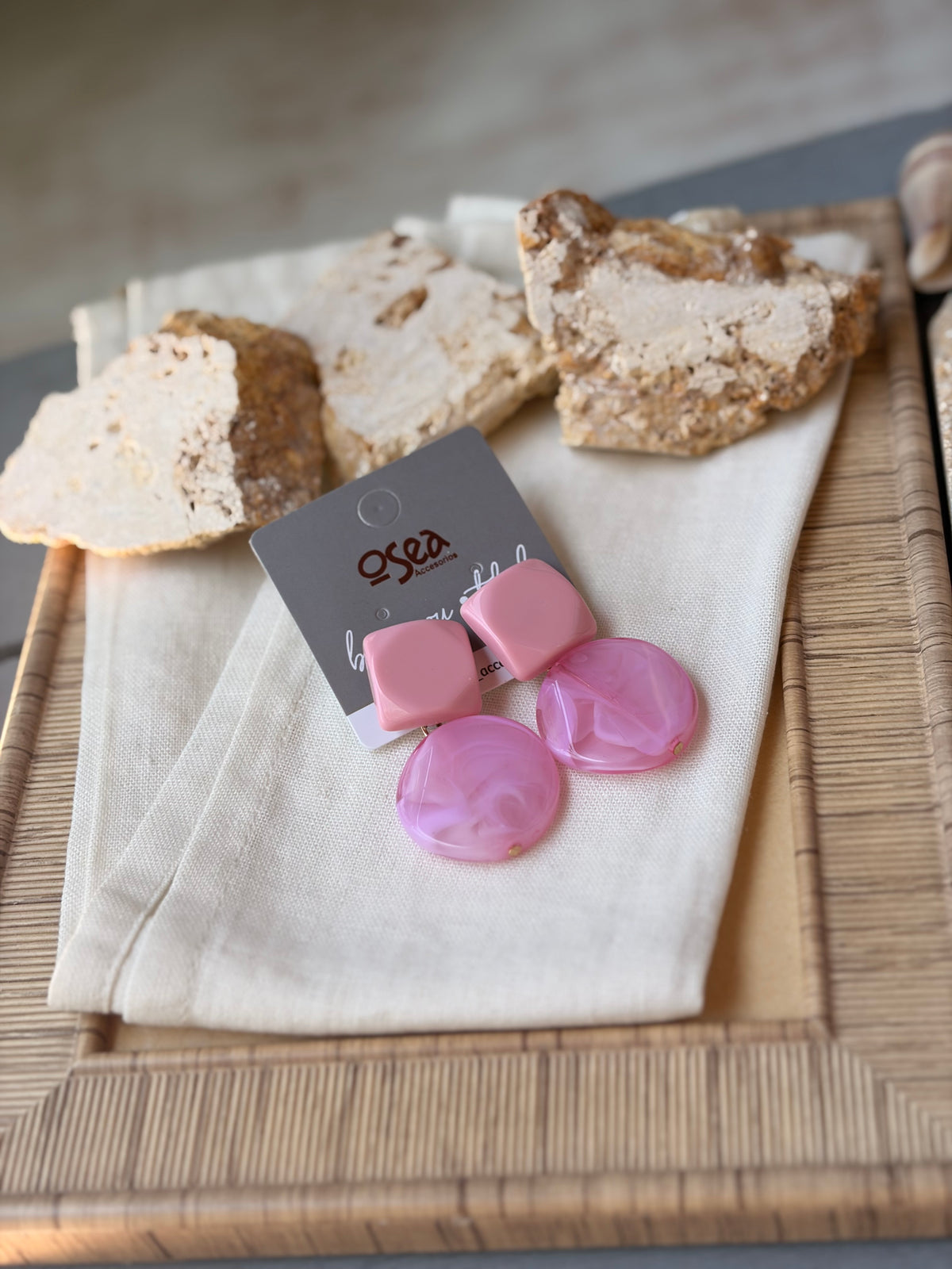Aretes en resina rosados doble cuerpo