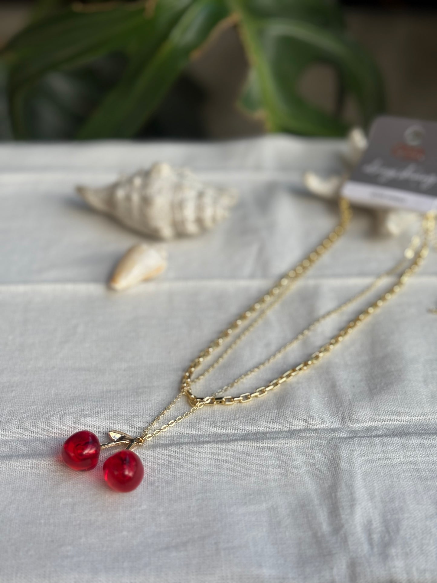 Collar rodinado doble dije cerezas