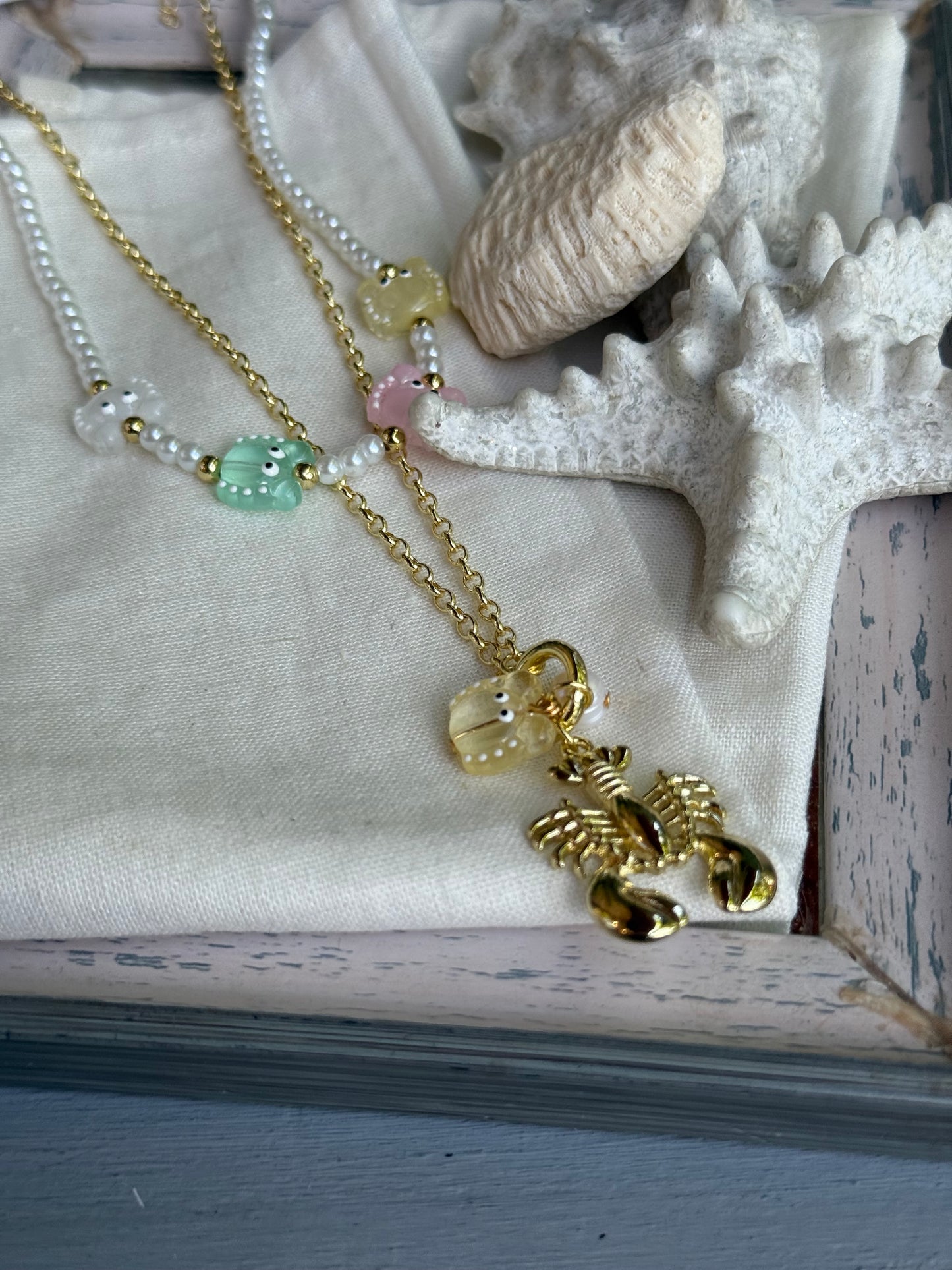 Collar doble calamares y langosta