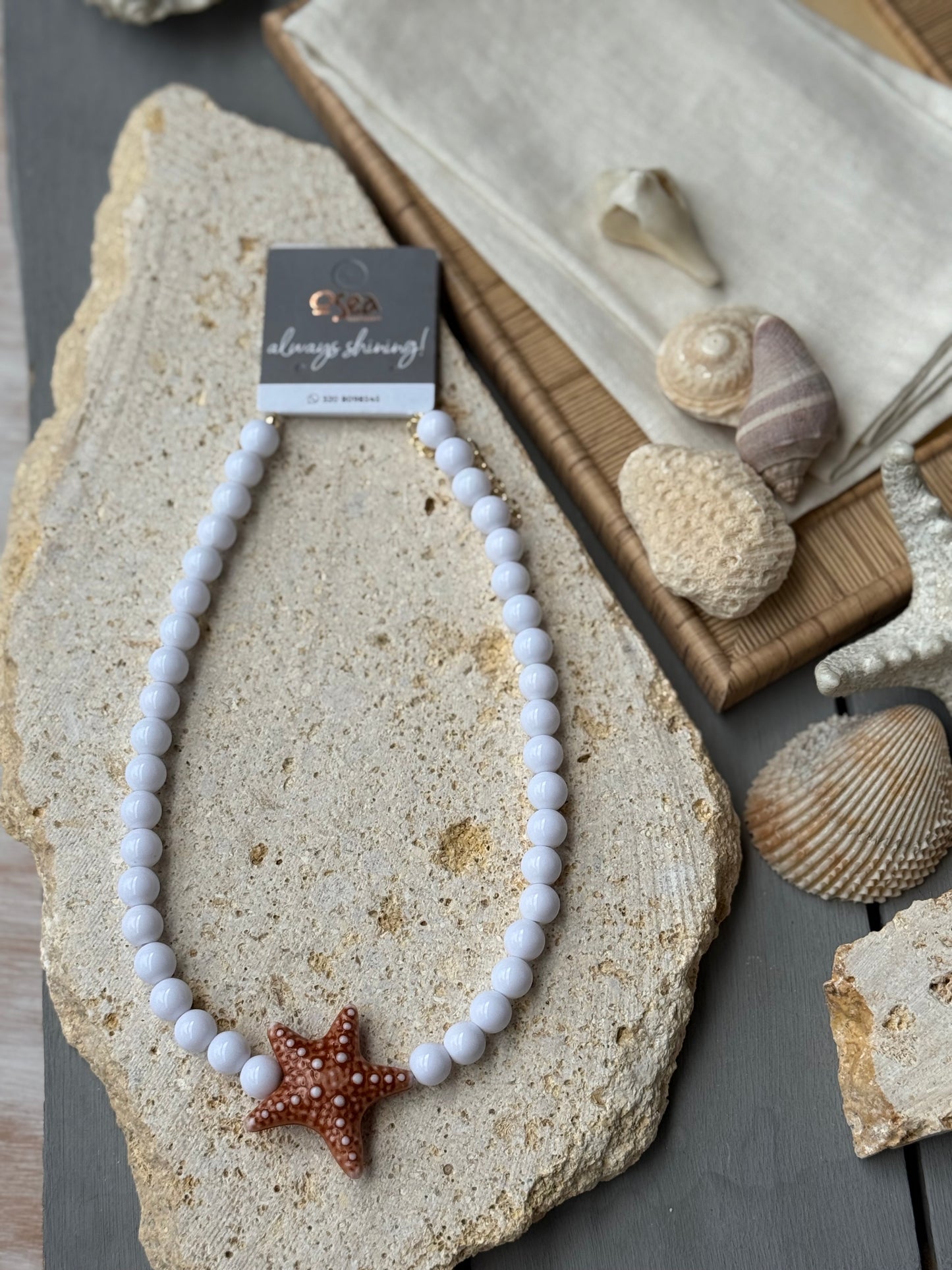 Collar bolas blancas dije estrella mar