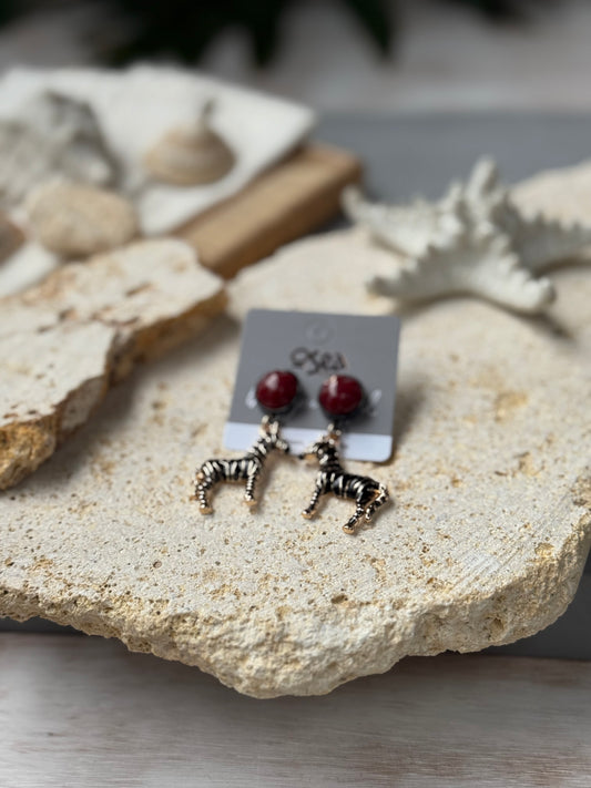 Aretes topo con dije de cebra