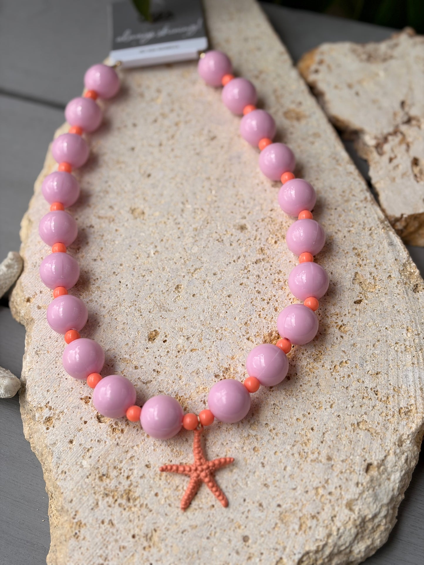 Collar bolas rosadas dije estrella de mar esmaltada