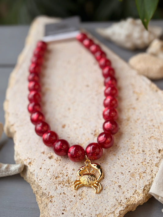 Collar bolas vinotinto efecto nacar dije cangrejo