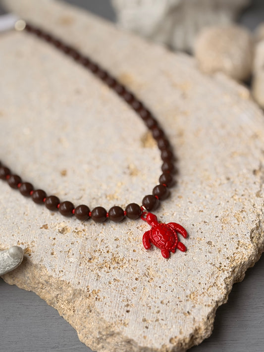 Collar bolas café dije tortuga roja