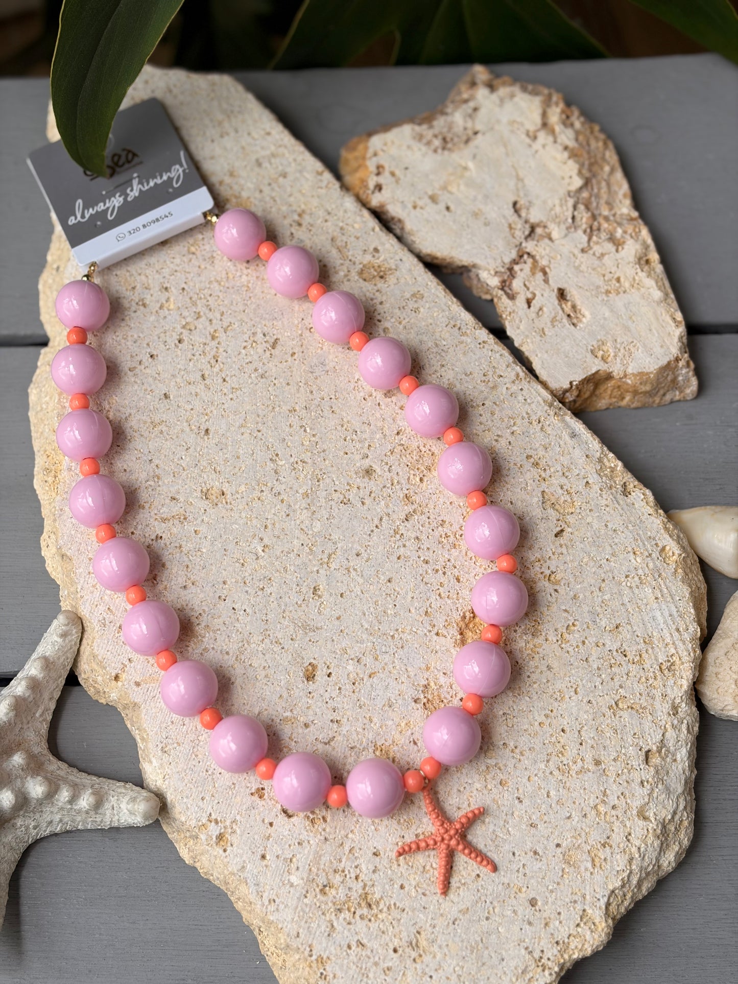 Collar bolas rosadas dije estrella de mar esmaltada
