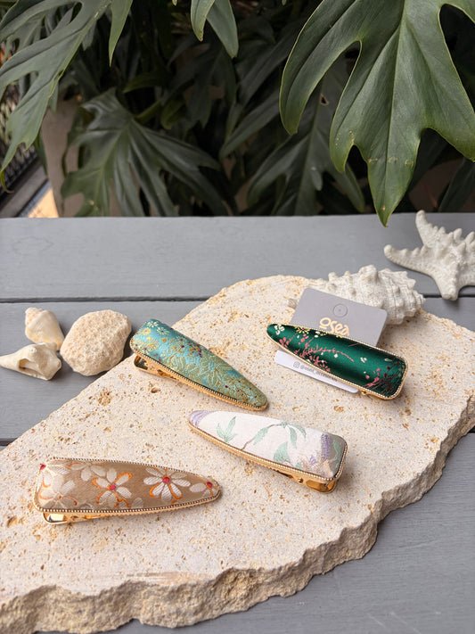 Pinza coquette en tela