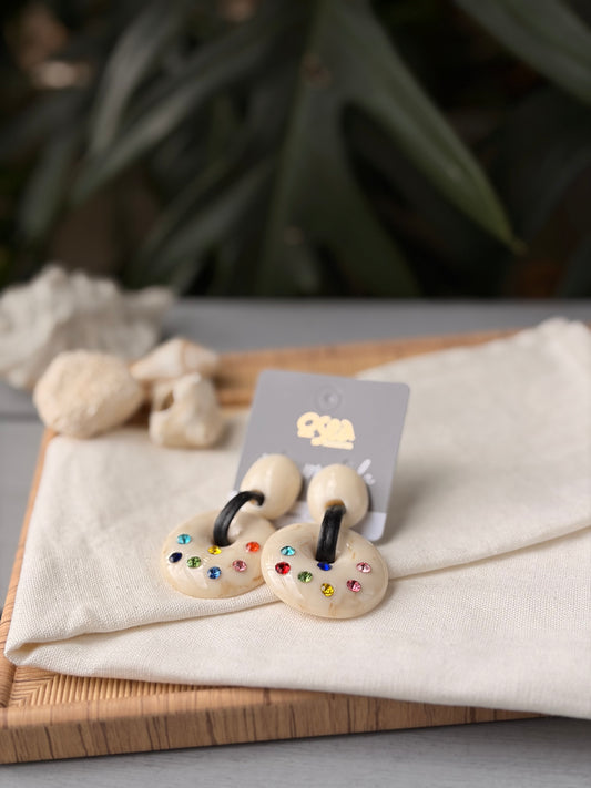 Aretes esferas resina con piedras colores