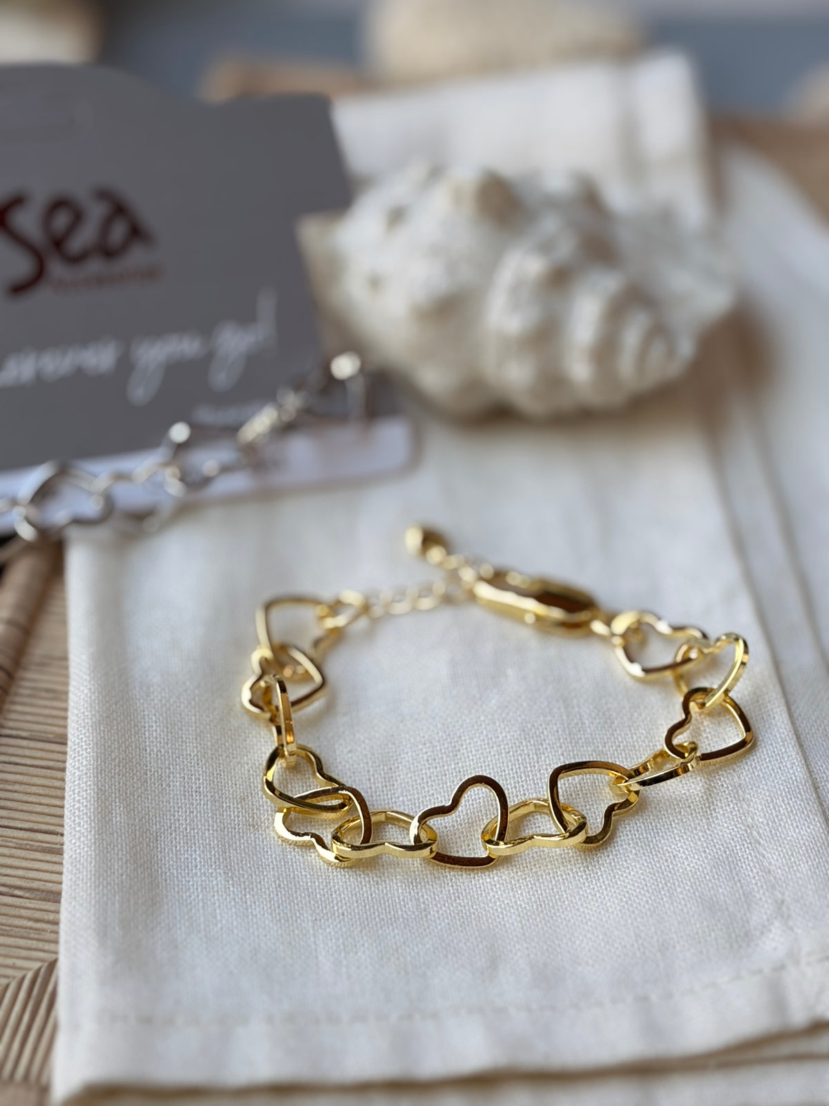 Pulsera rodinada corazones enlazados