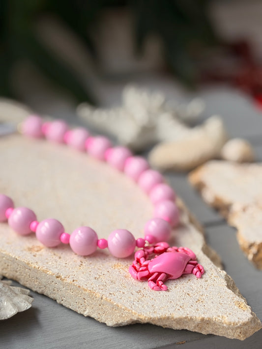 Collar bolas rosadas dije cangrejo