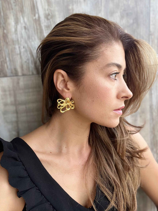 Topos en forma de pulpo con baño de oro