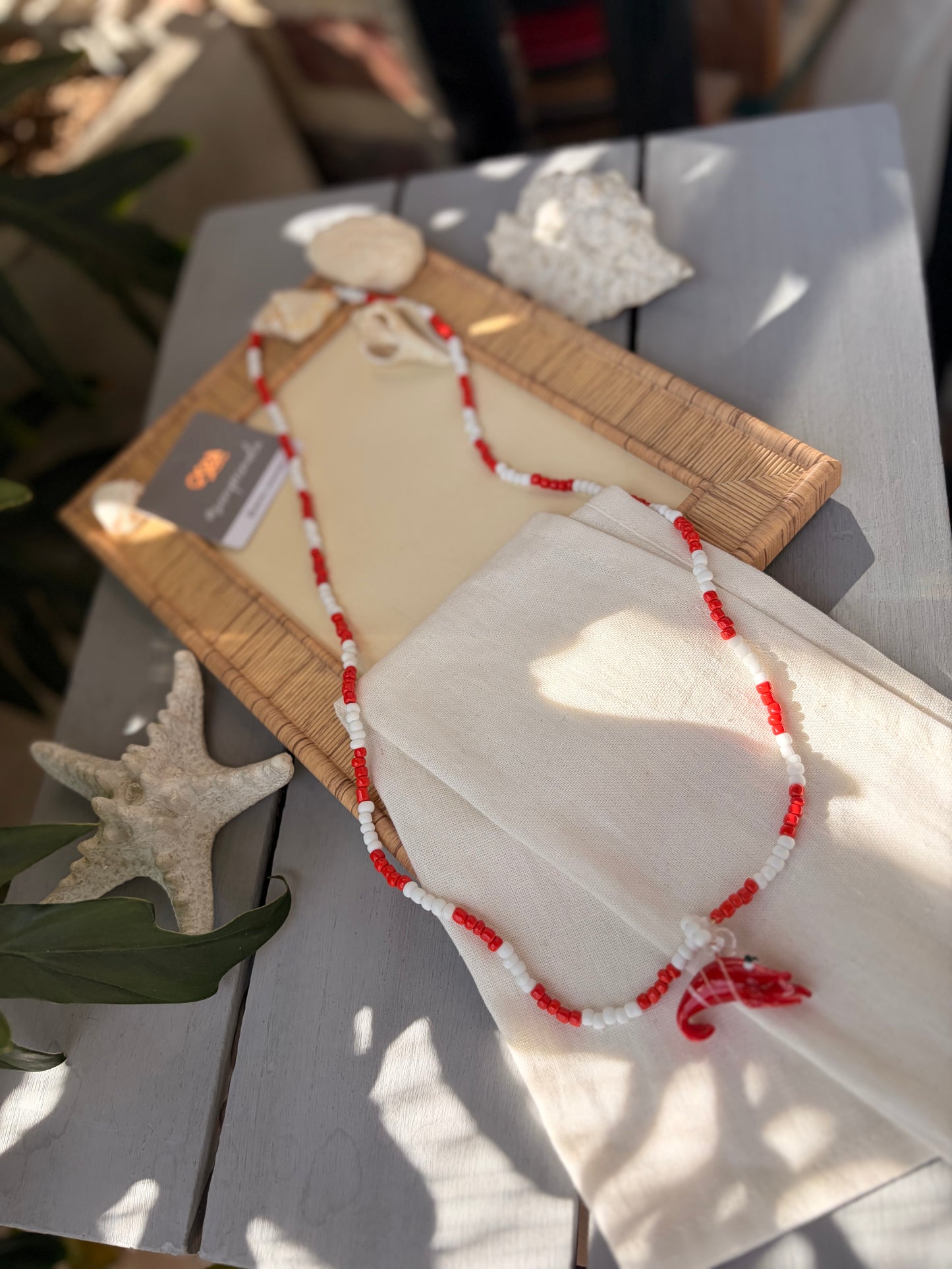 Collar largo en mostacilla dije langosta en cristal