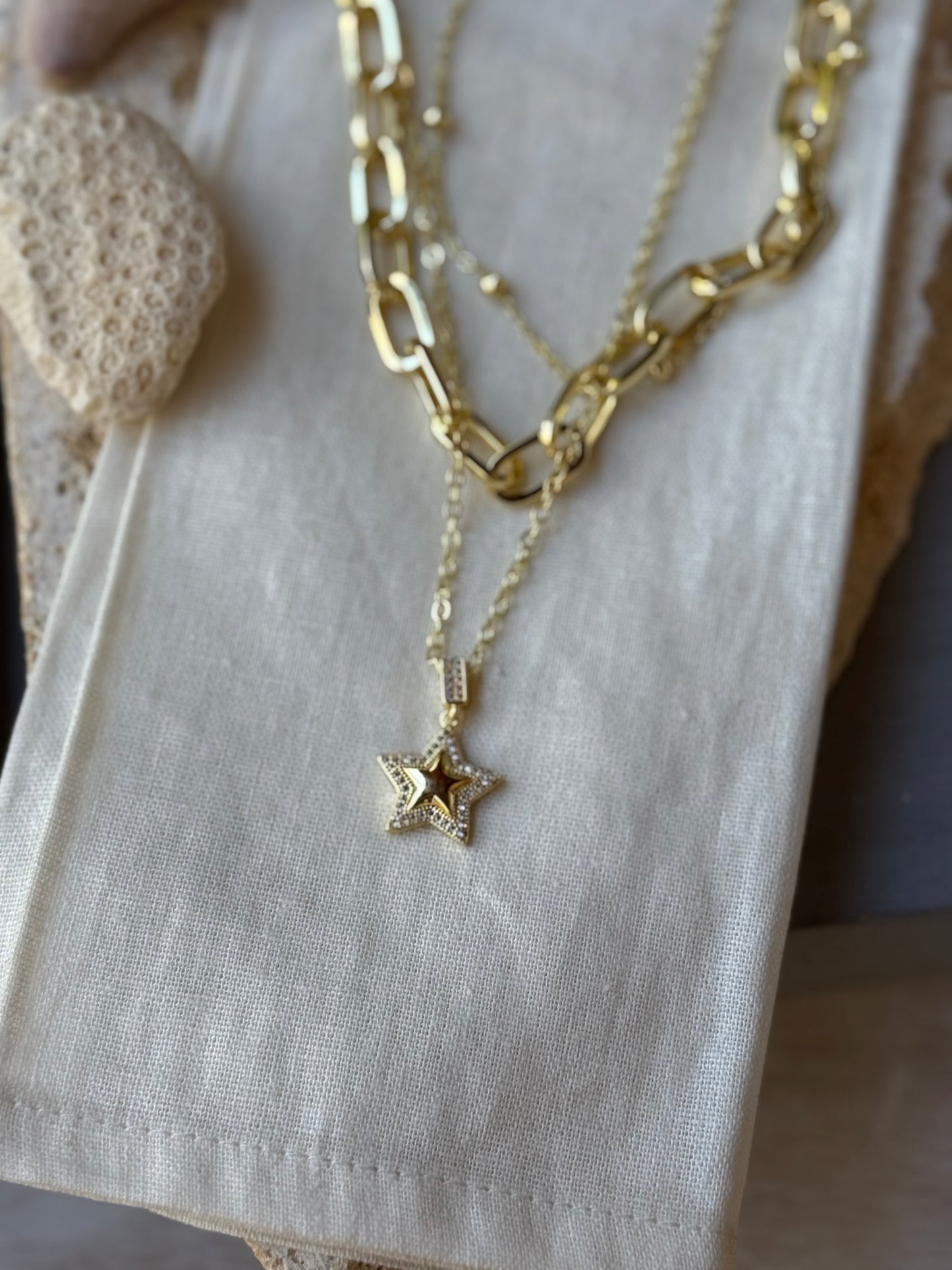 Cadena rodinada triple dije estrella