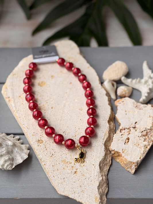 Collar bolas vinotinto perlado dije cangrejo