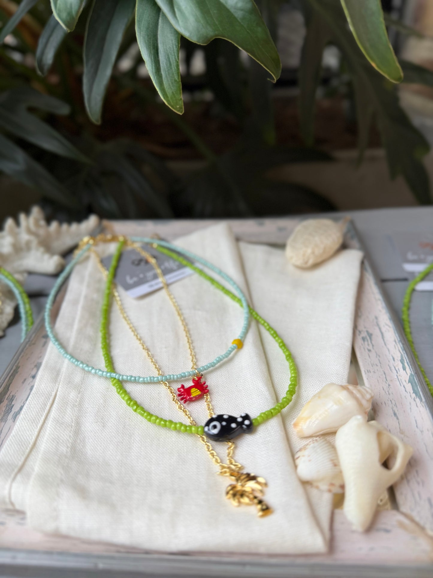 Collar triple palmera y pez