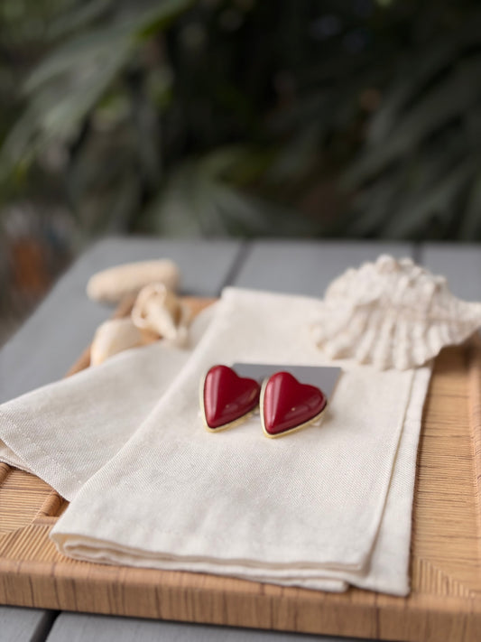 Topos en corazón rojo