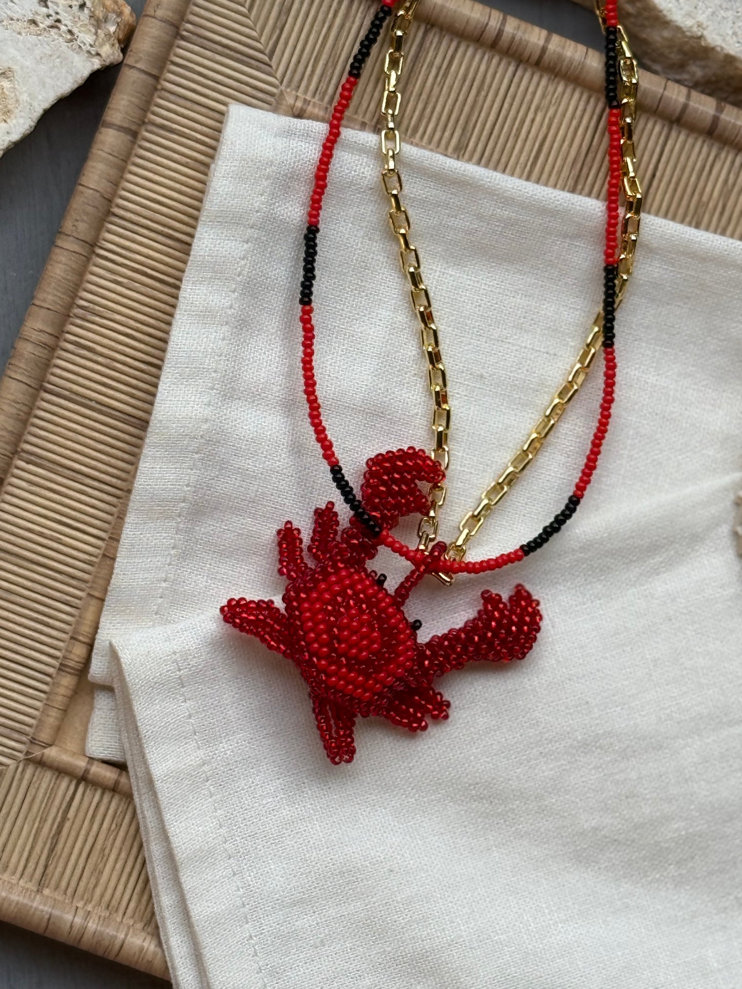 Collar largo doble cangrejo en mostacilla doble faz