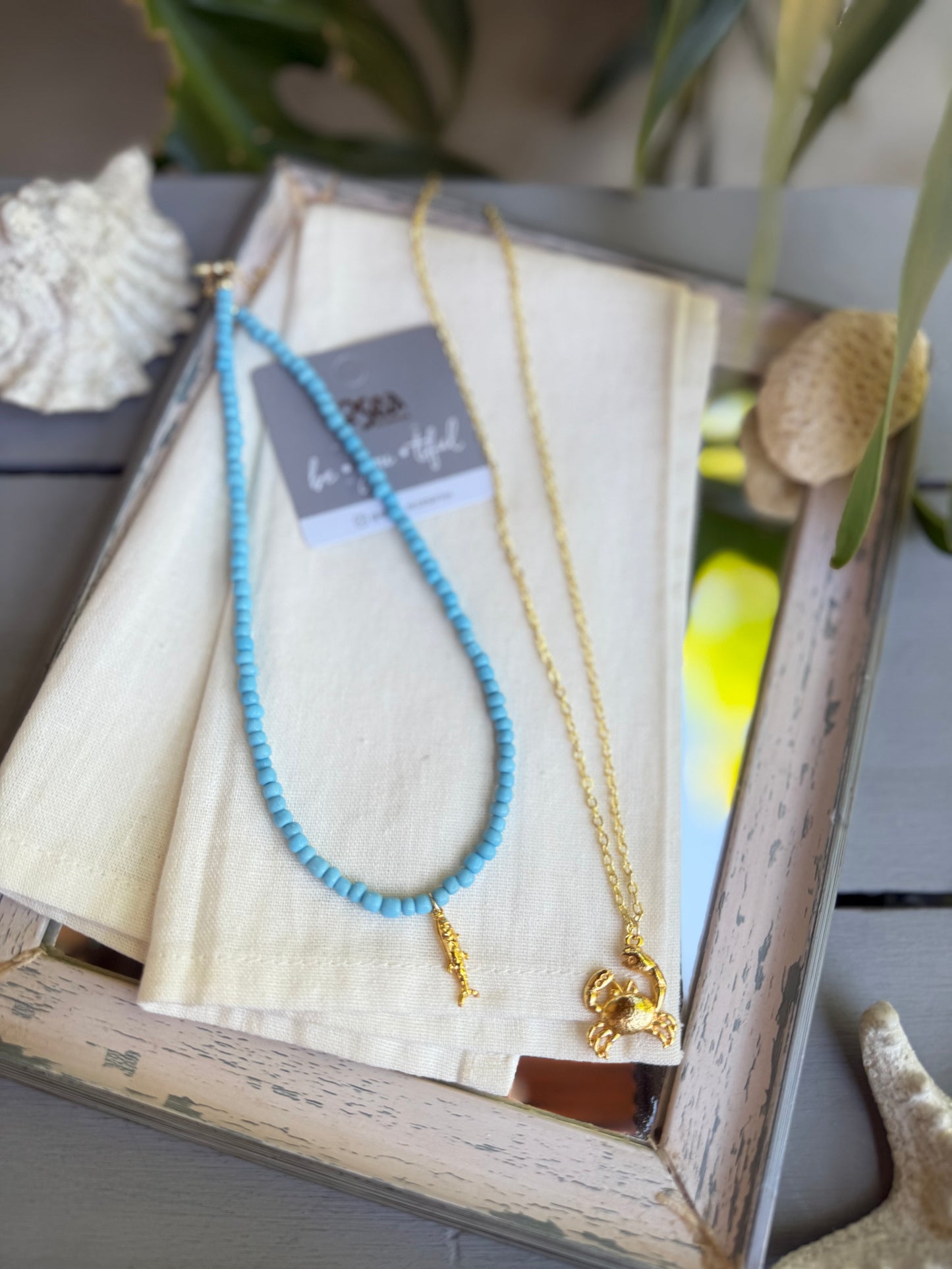 Set de collar de pez y cangrejo