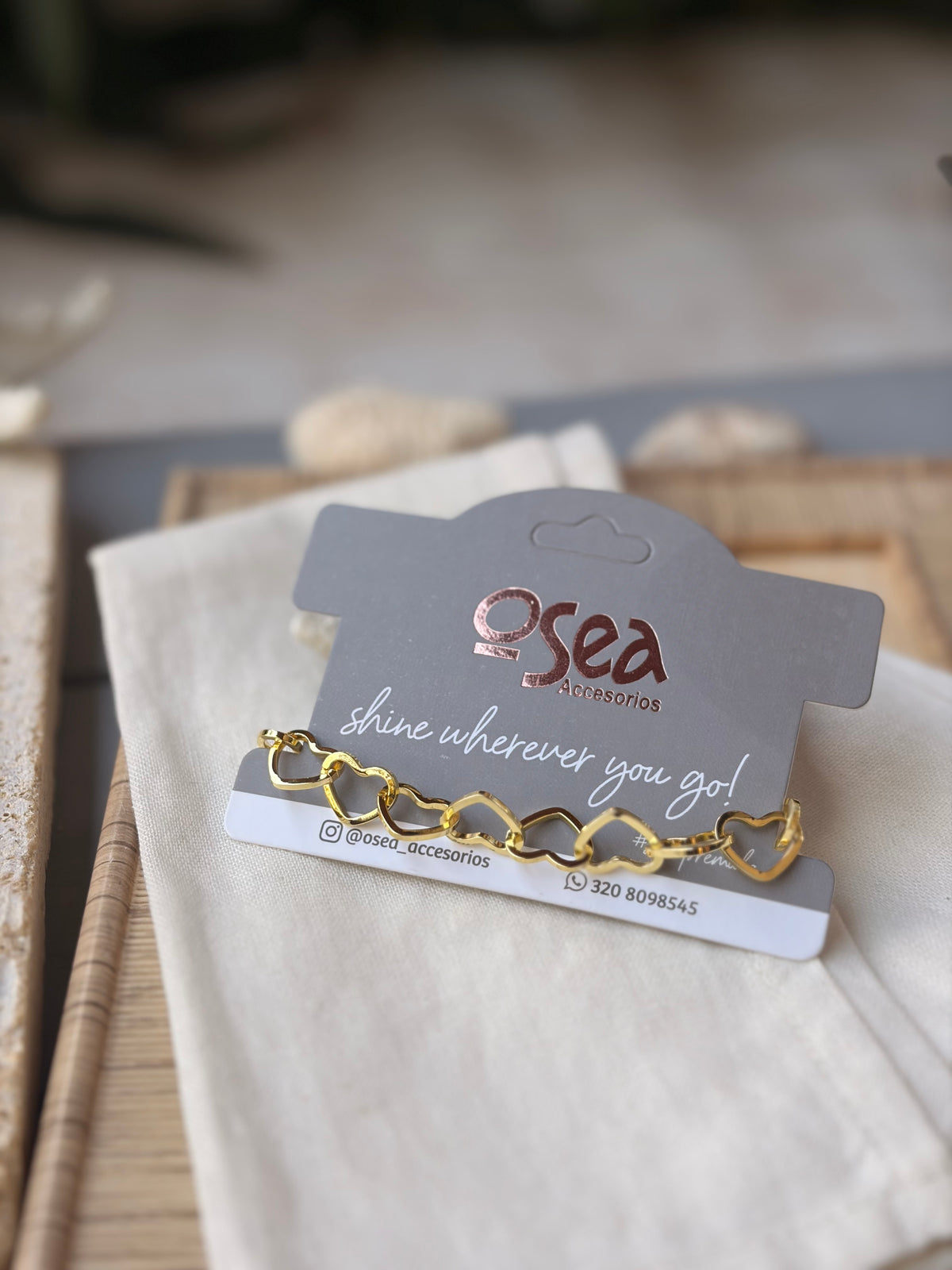 Pulsera rodinada corazones enlazados