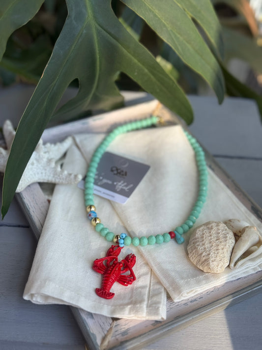Collar piedras verdes dije langosta roja
