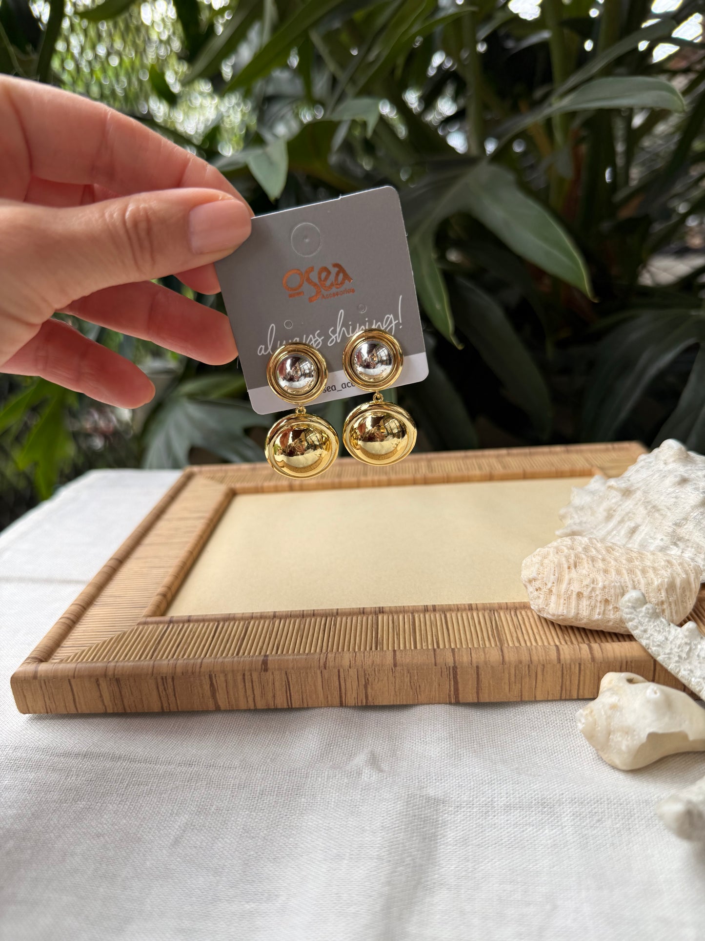 Arete rodinado doble bola bicolor