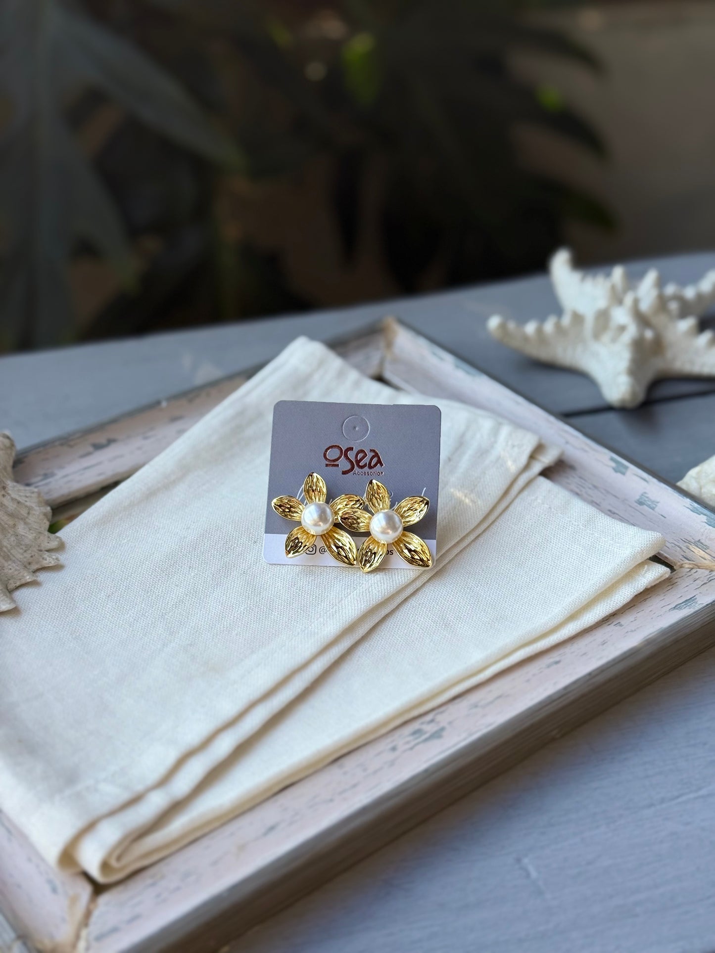 Topos rodinados de flor con perla
