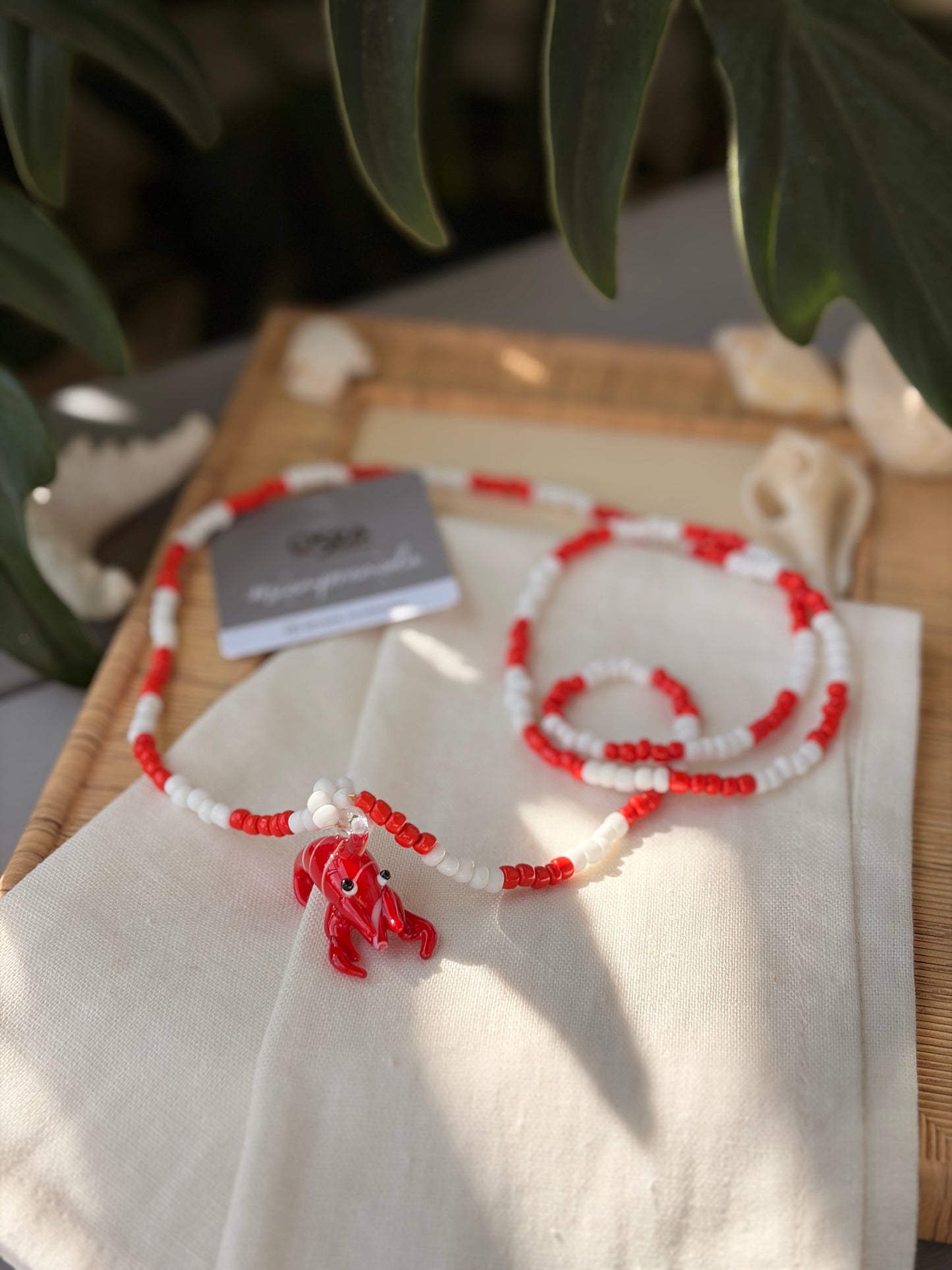 Collar largo en mostacilla dije langosta en cristal